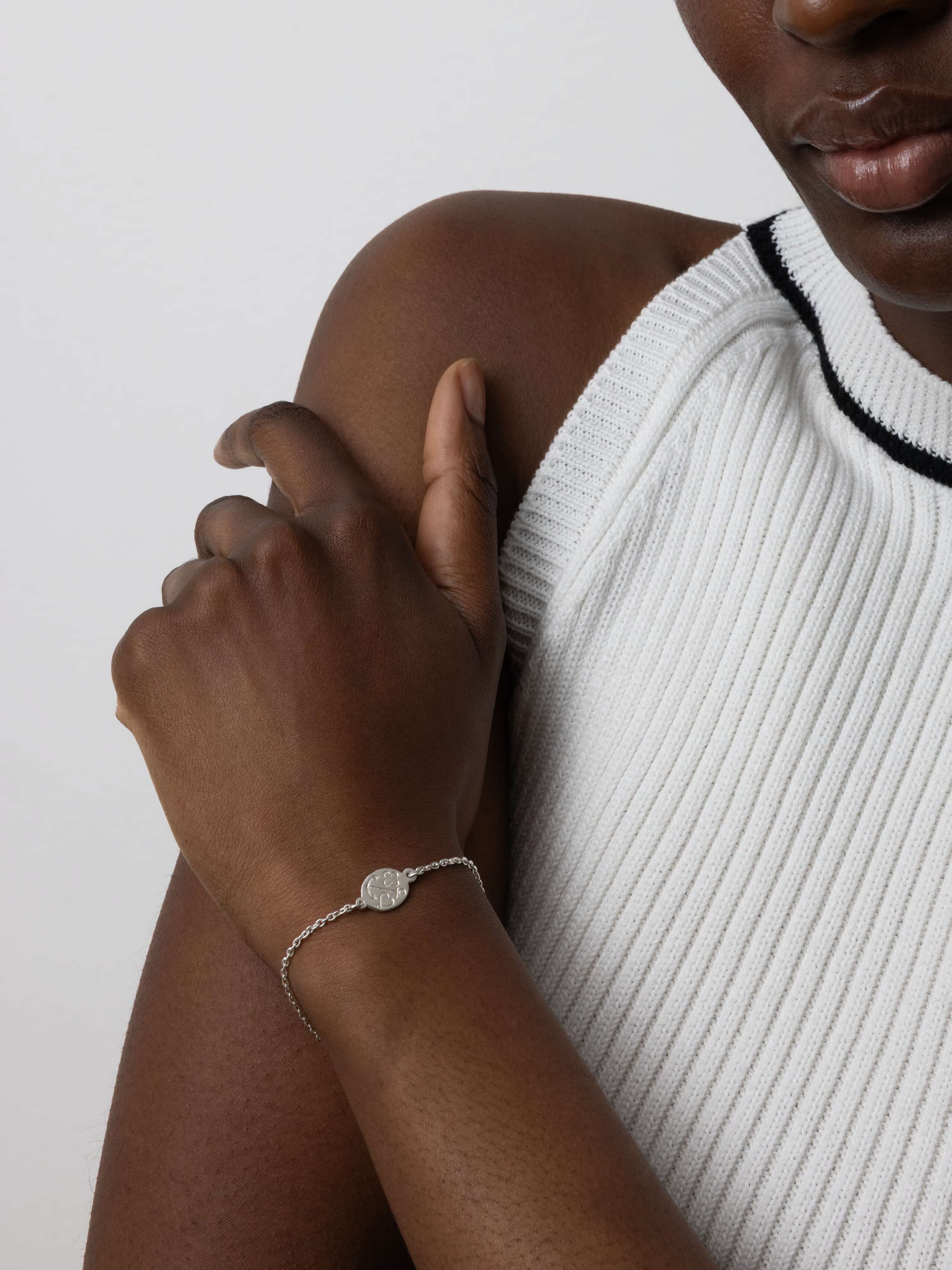 Product Shot of Love Luck Hope Bracelet Silver on Model