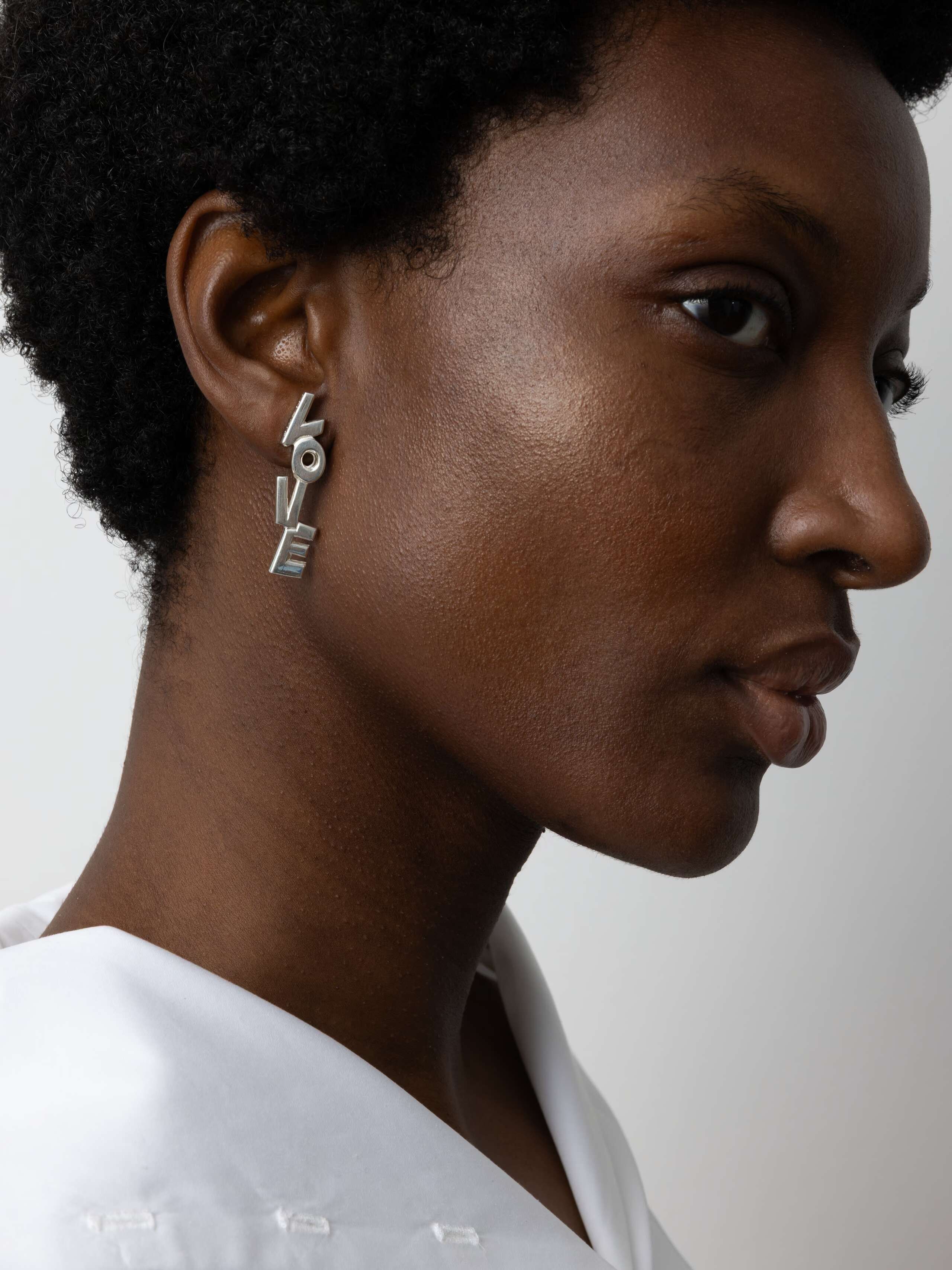 Product Shot of LRF Earrings Silver on Model