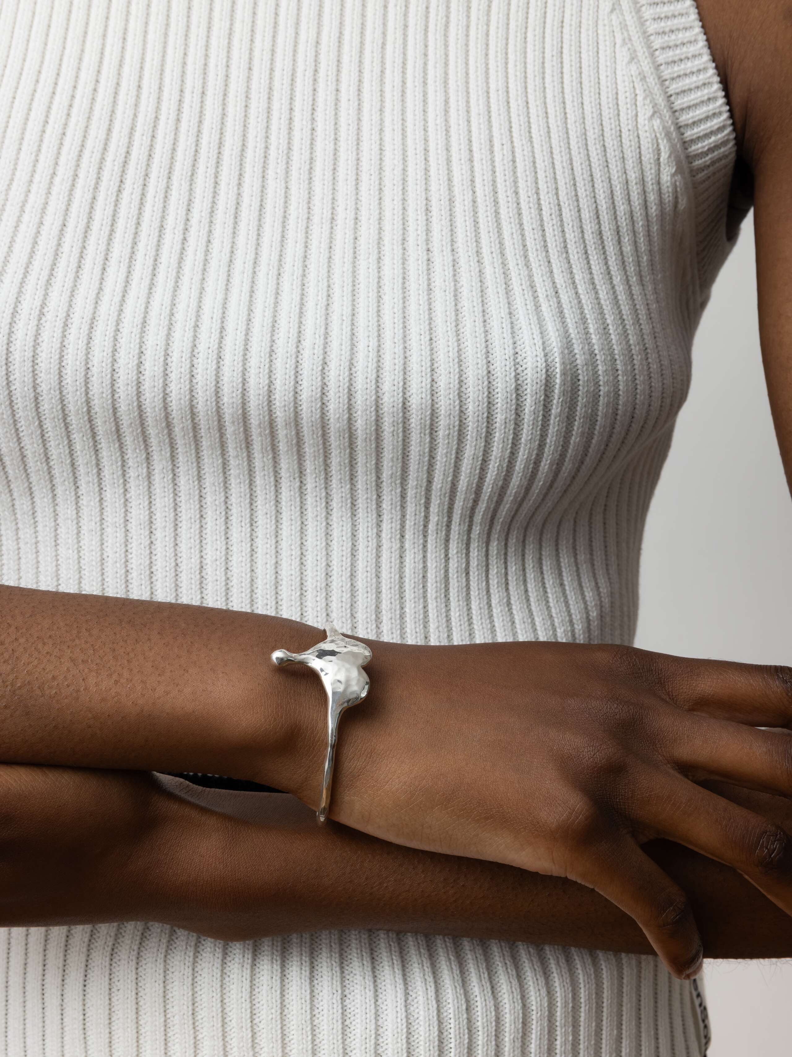 Product Shot of Soft Heart Bangle Silver on Model