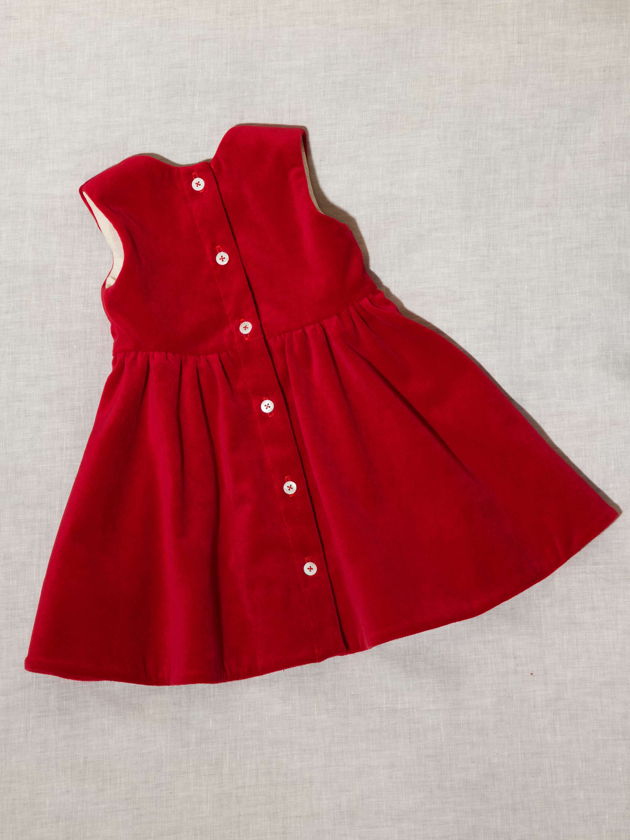 Beautiful cotton velvet baby dress sleeveless with navy silk bow handmade in Zurich, red cotton velvet