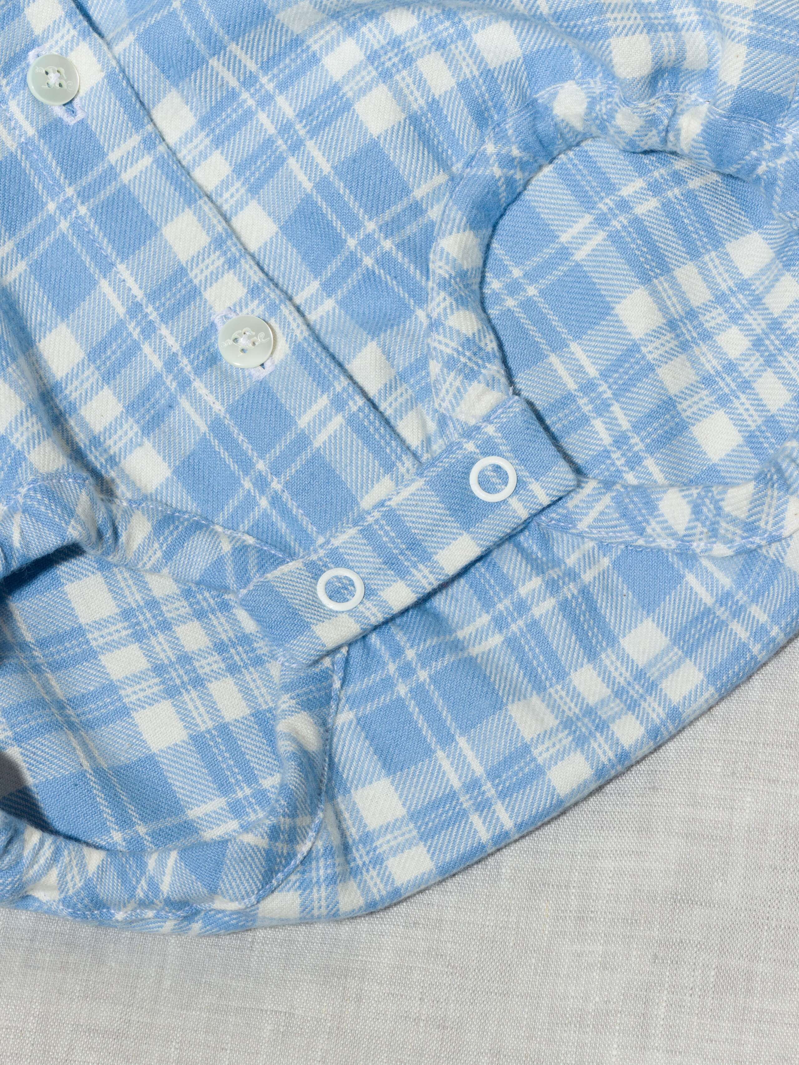 Beautiful handmade cotton flannel baby body in a soft check pattern with long sleeves, light blue
