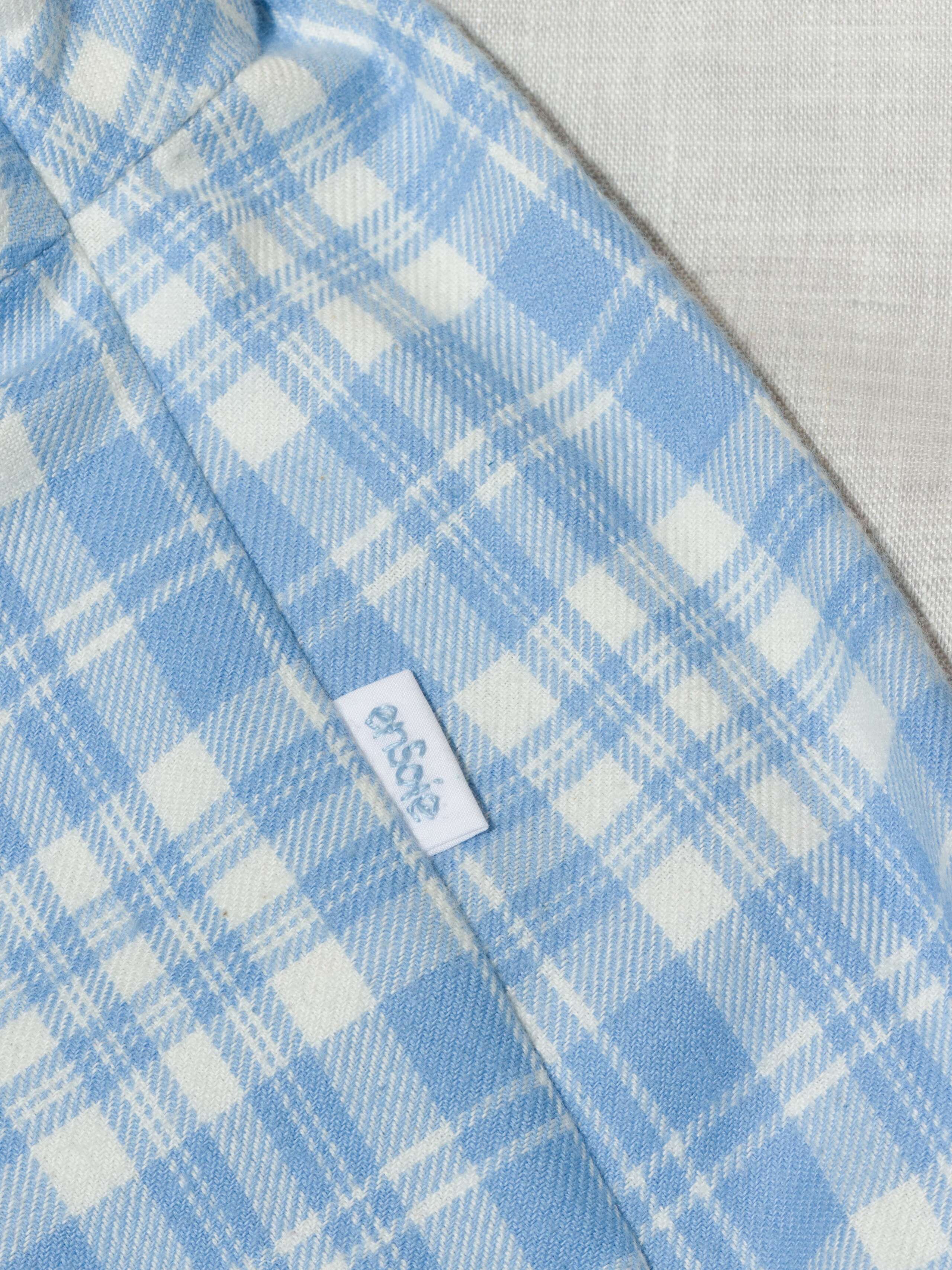 Beautiful handmade cotton flannel baby body in a soft check pattern with long sleeves, light blue