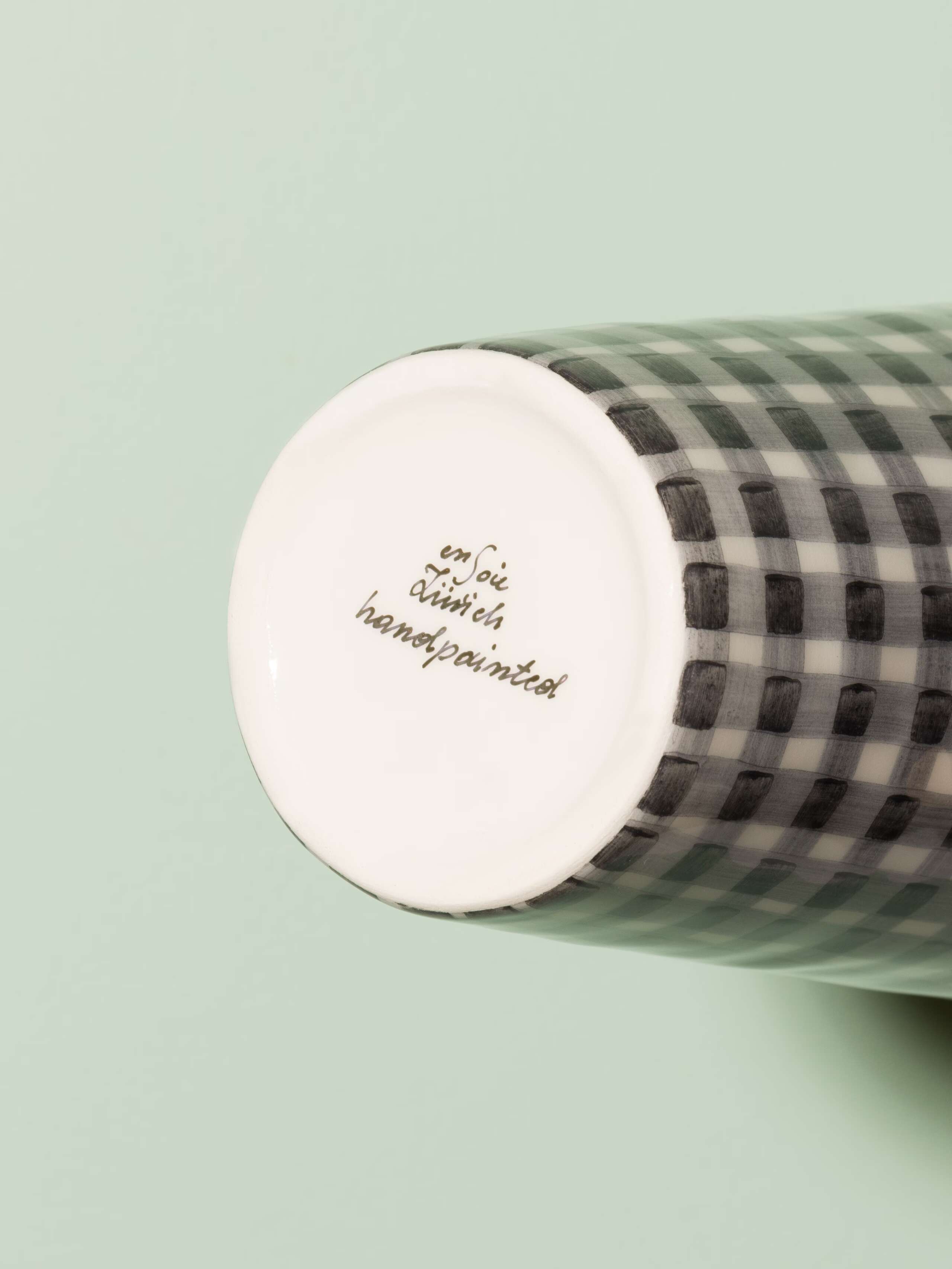 Picture of a small vase featuring a beautiful vichy check pattern in black