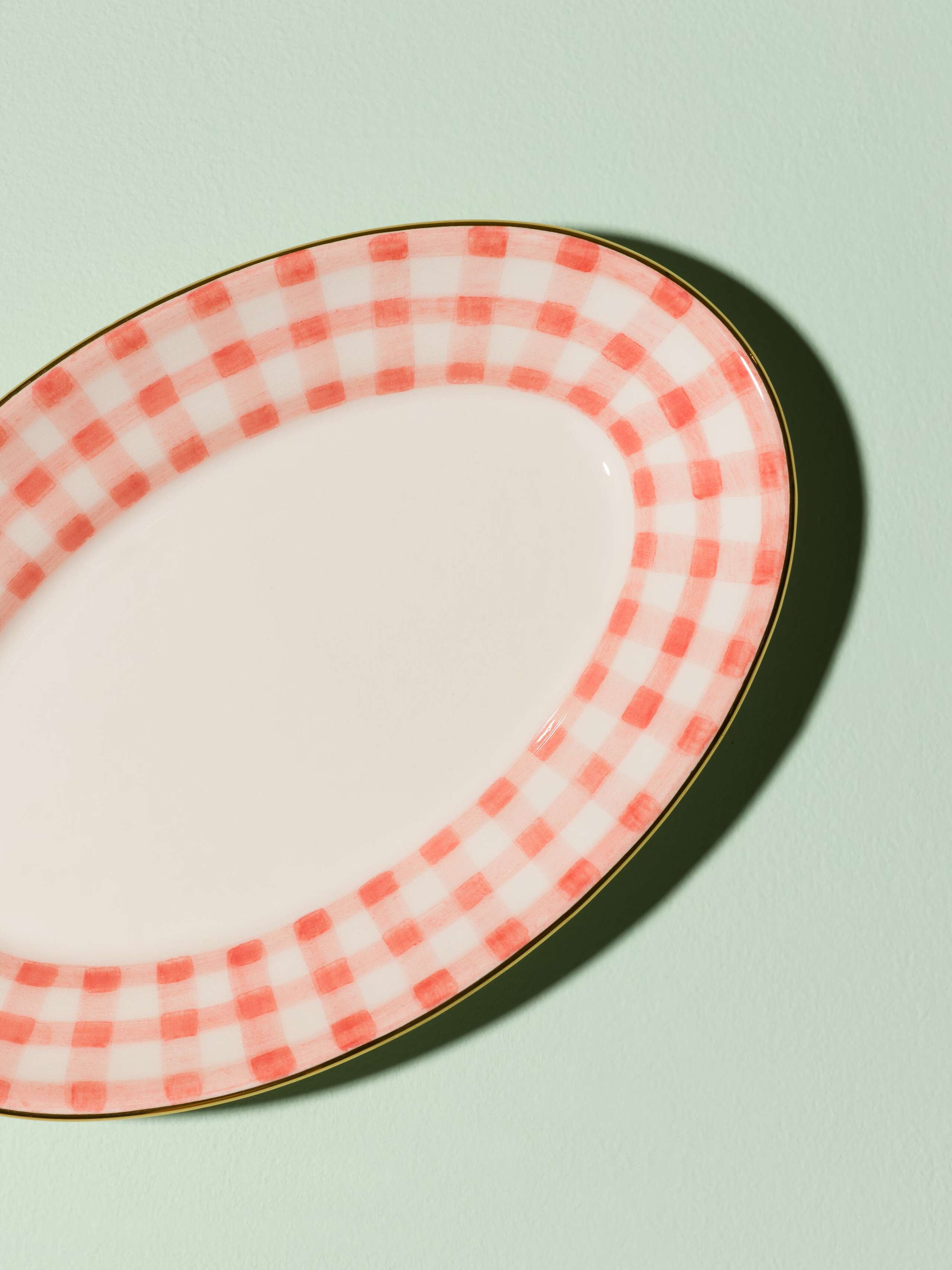 Picture of a beautiful handmade tapas plate featuring a classic pink vichy check pattern