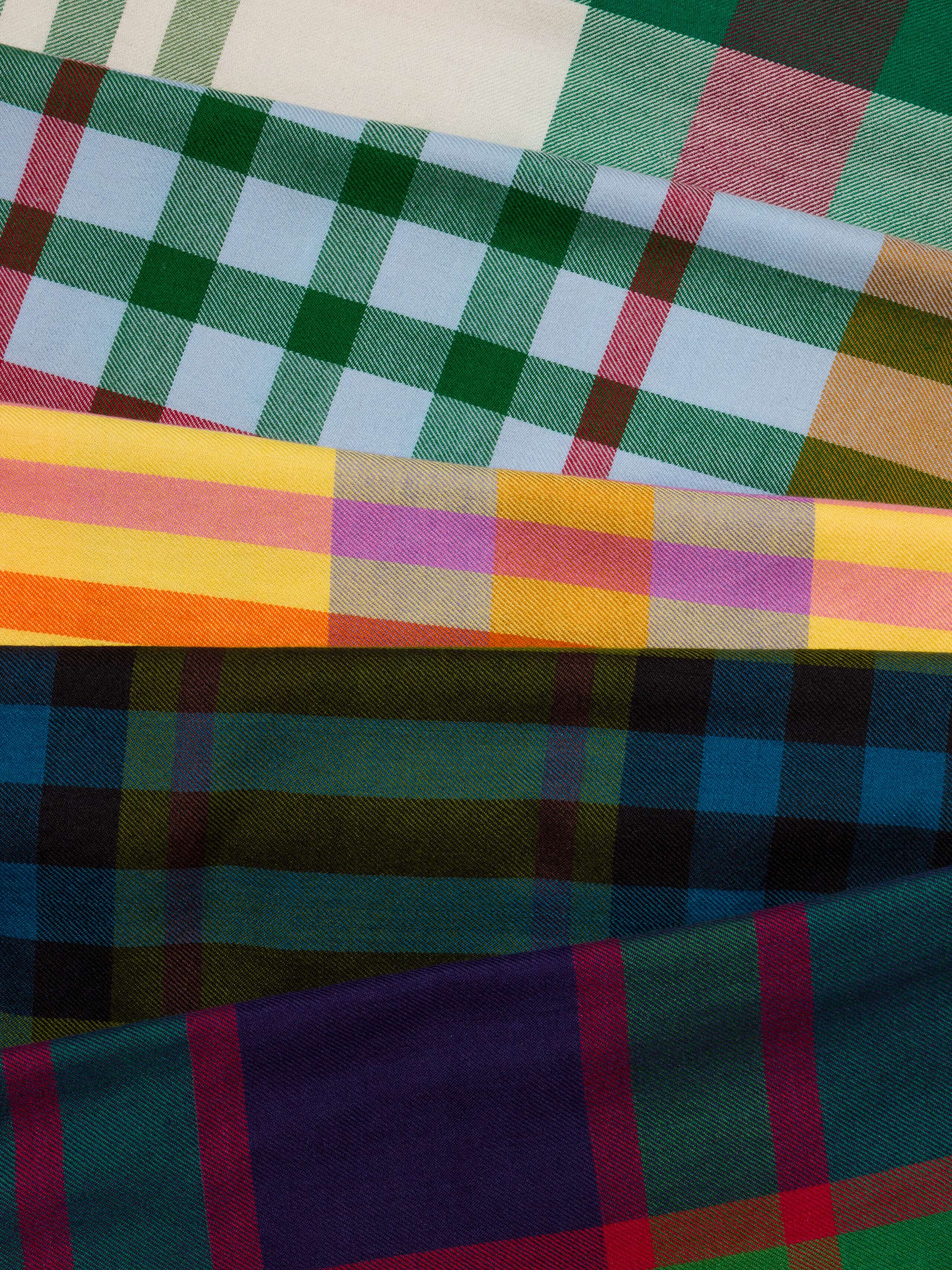 Picture of four check scarfs