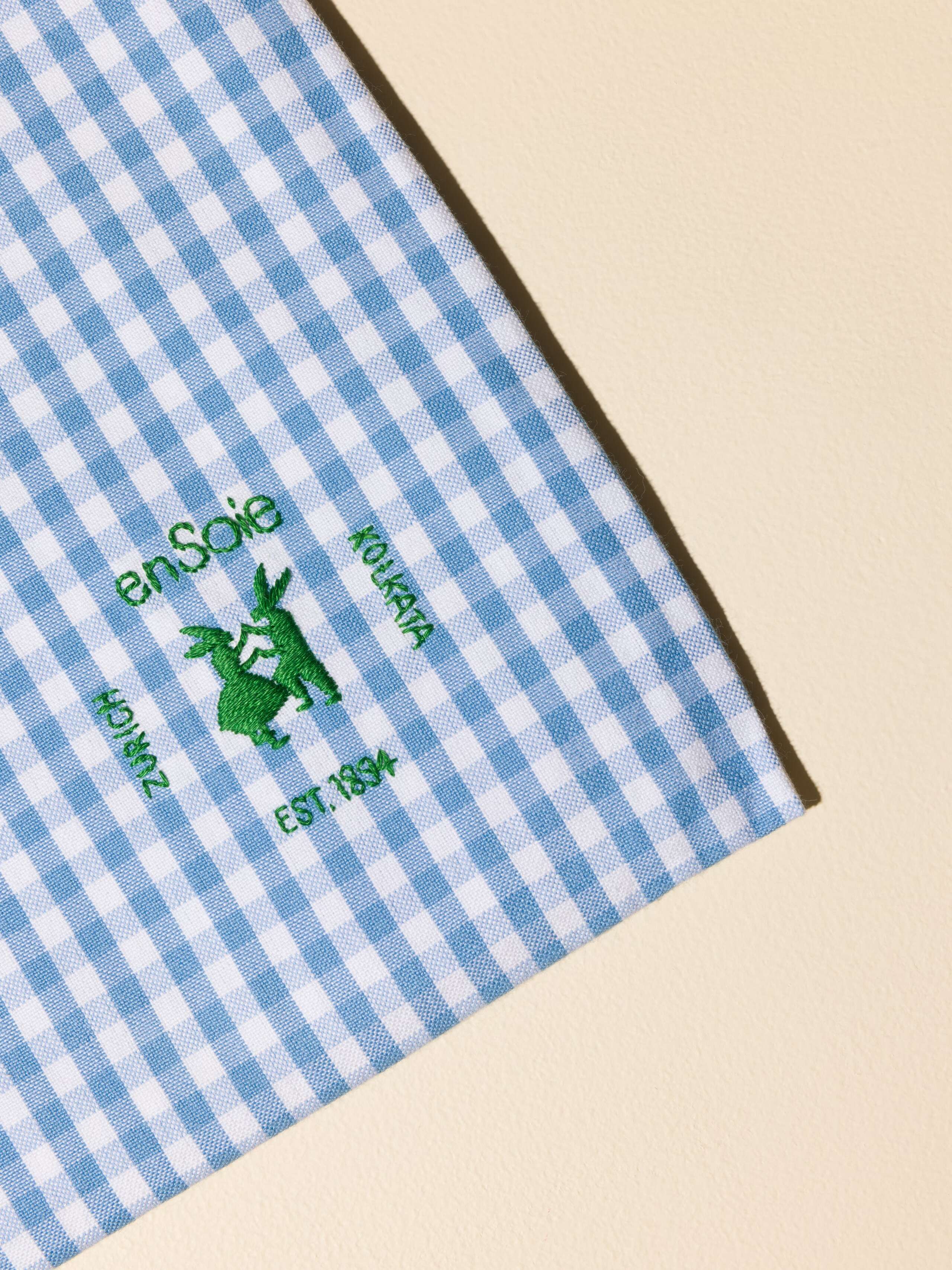 Picture of a detail of a light blue tote bag