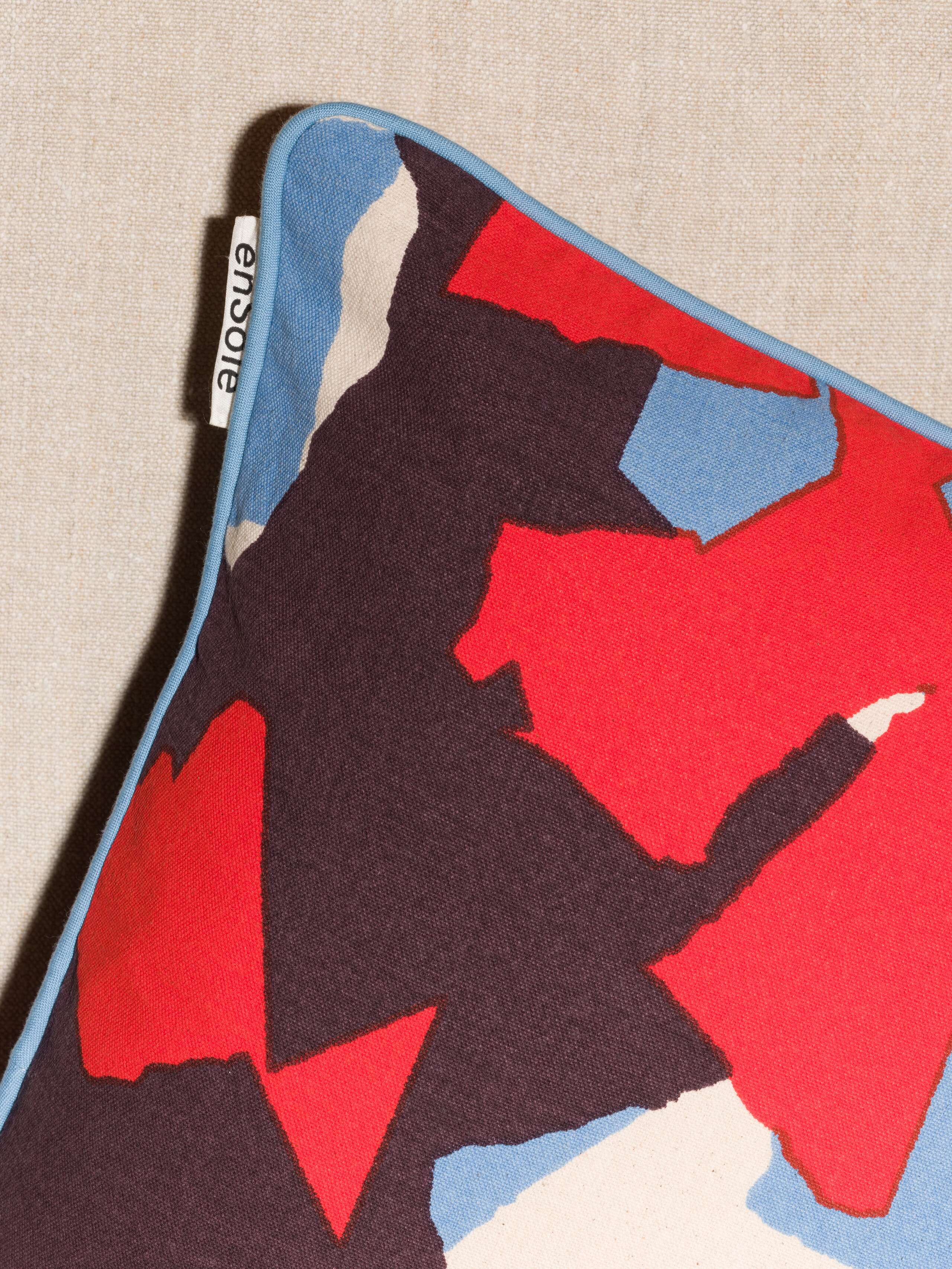 Picture of the Terrazzo Pillow covers printed in red and blue tones