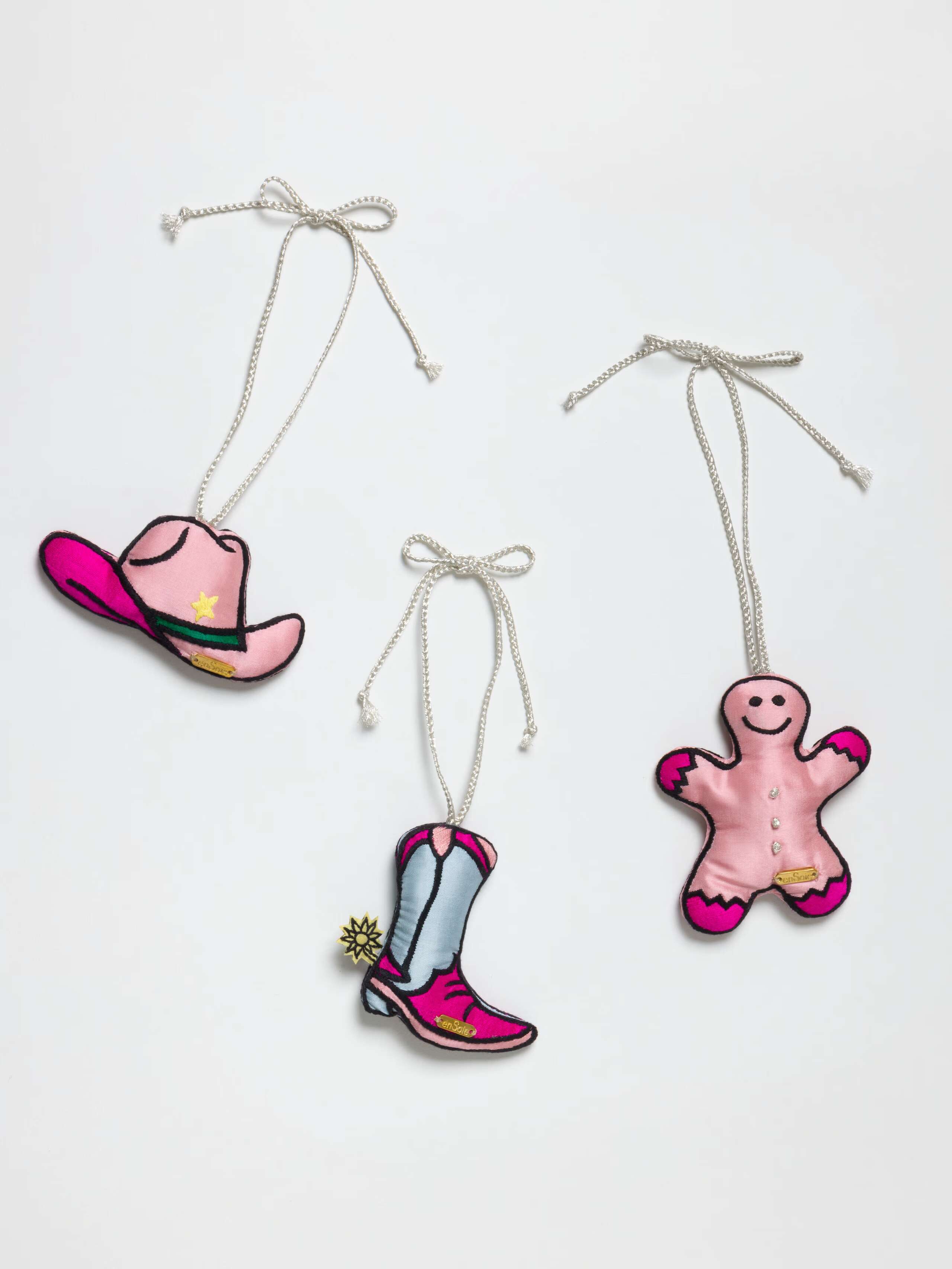 Picture of three pinkish silk tree ornaments