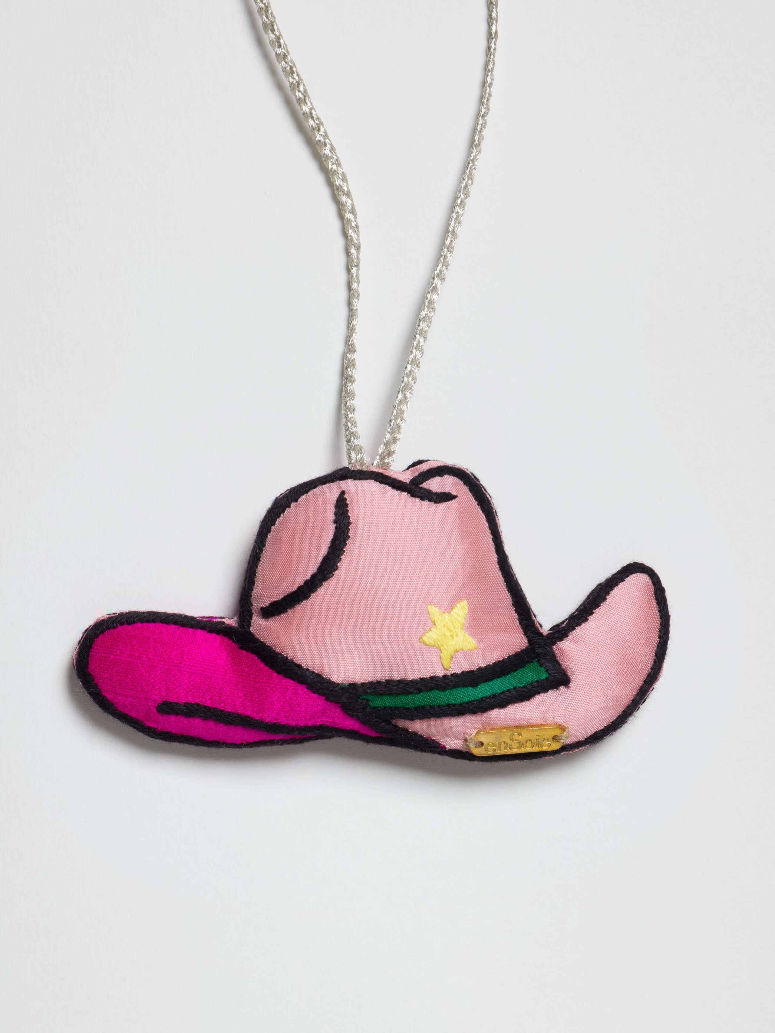 Picture of a slik tree ornament in cowboy hat shape