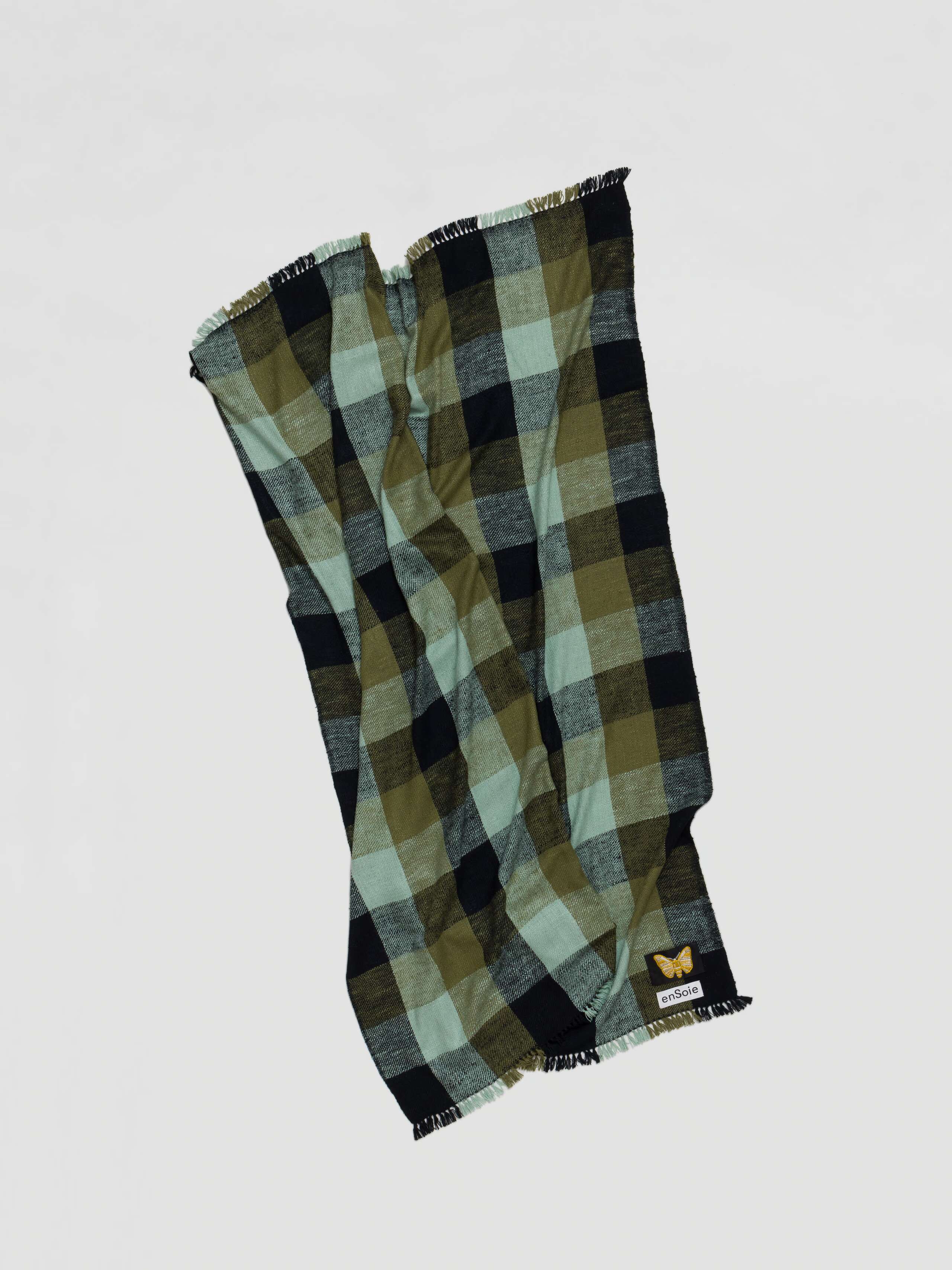 Picture of the square Blia handspun silk stole in a green check