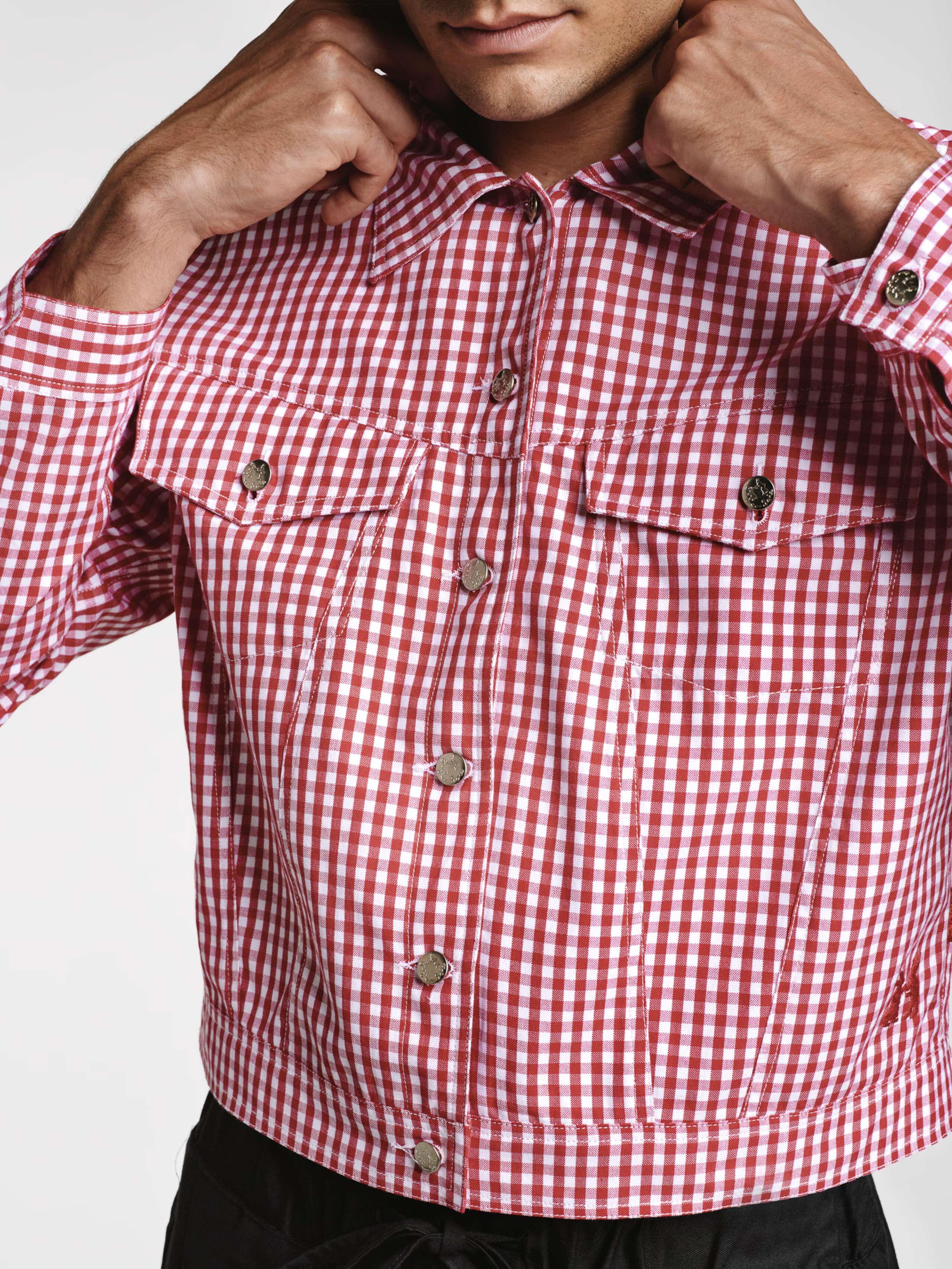 Model wearing the red vichy check Jill jacket
