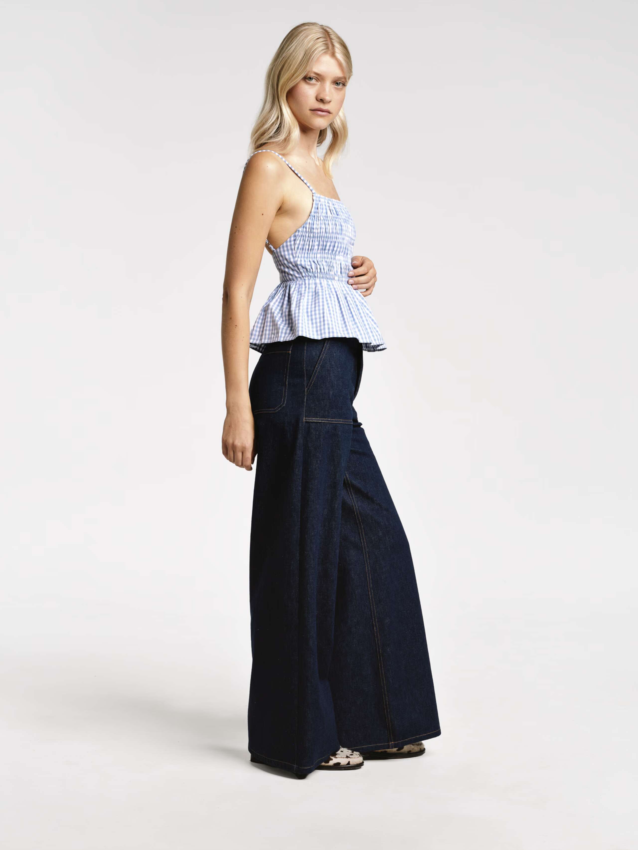 Model wearing the lightblue vichy Val top