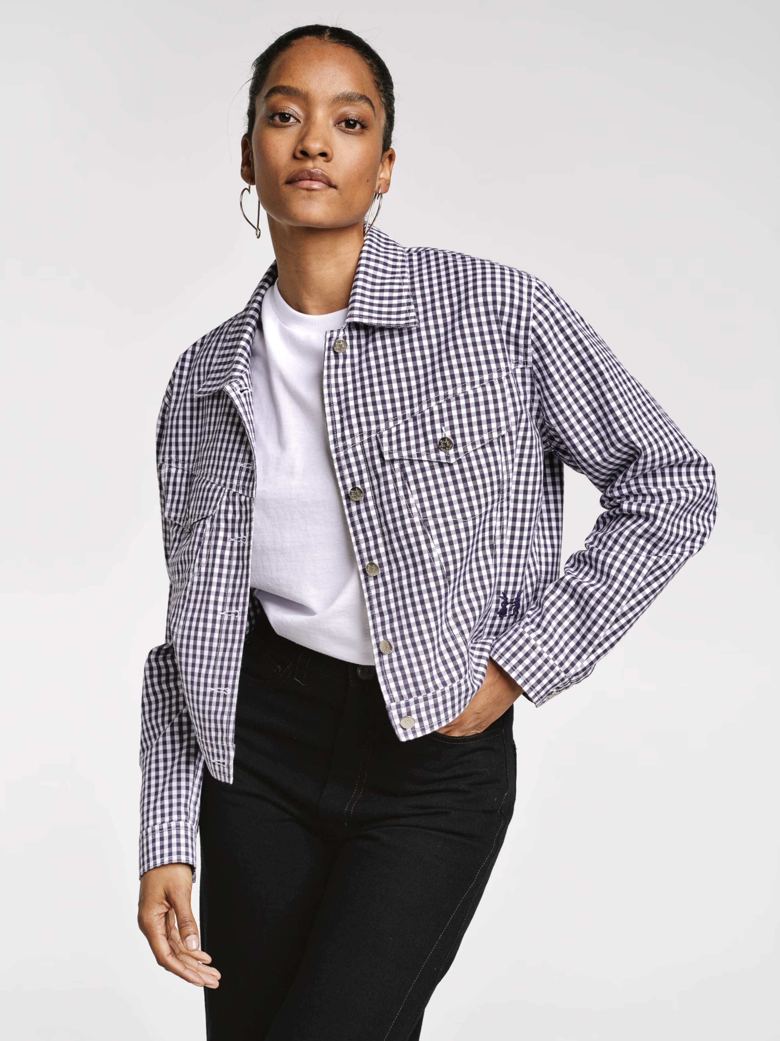 Model wearing the navy vichy check Jill jacket