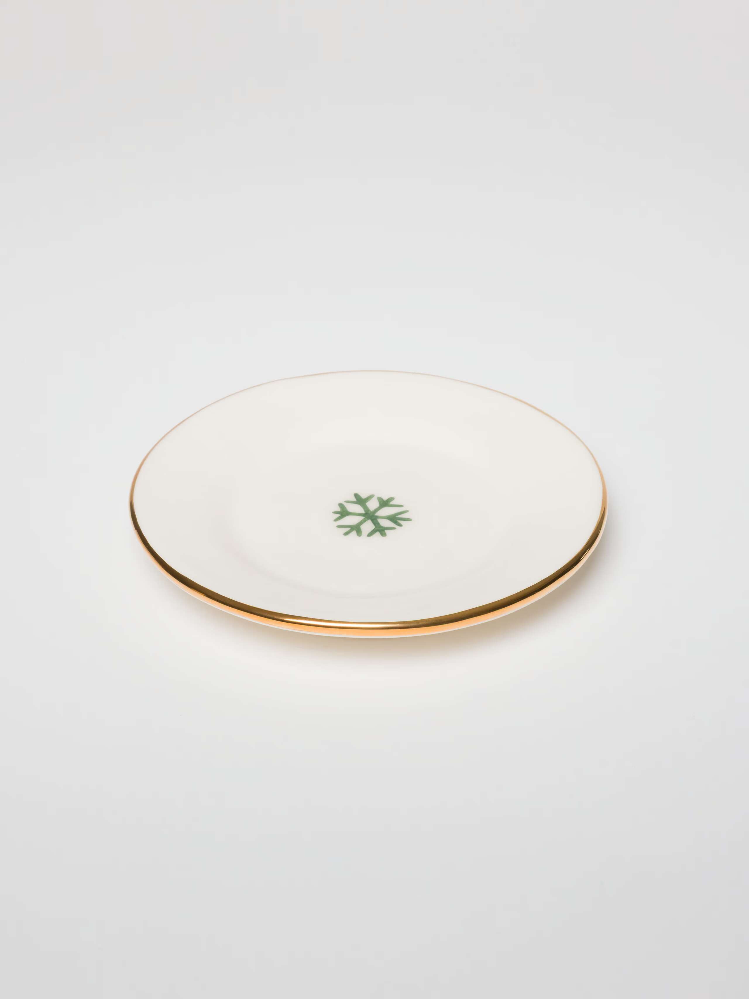 Picture of a small plate featuring a snowflake motif