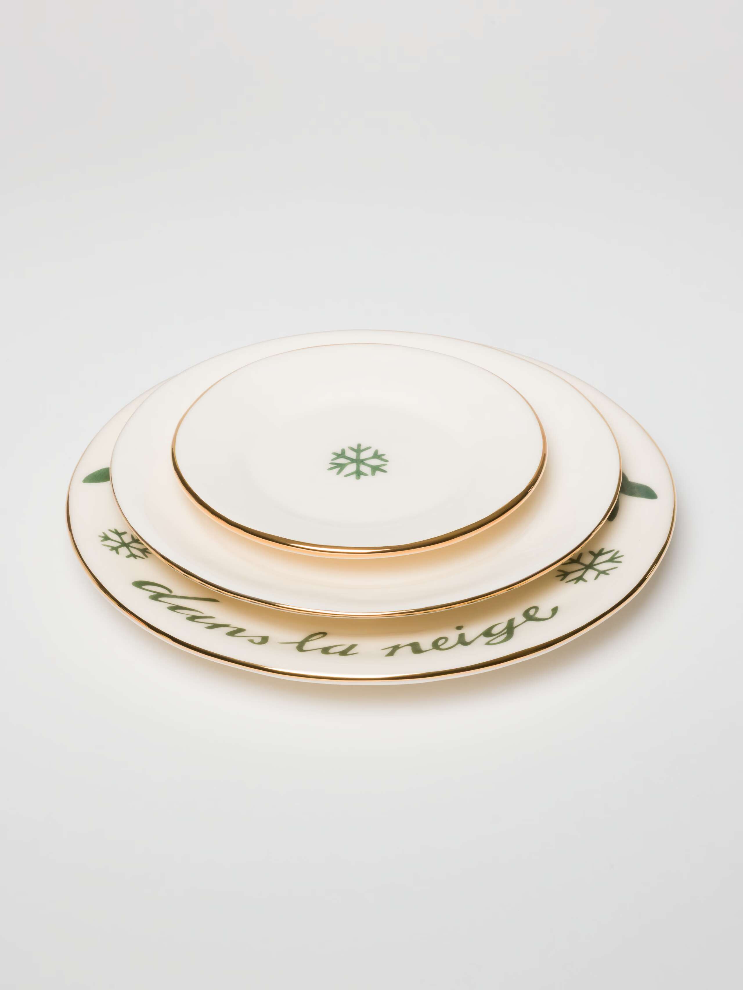Picture of three plates with winter motifs