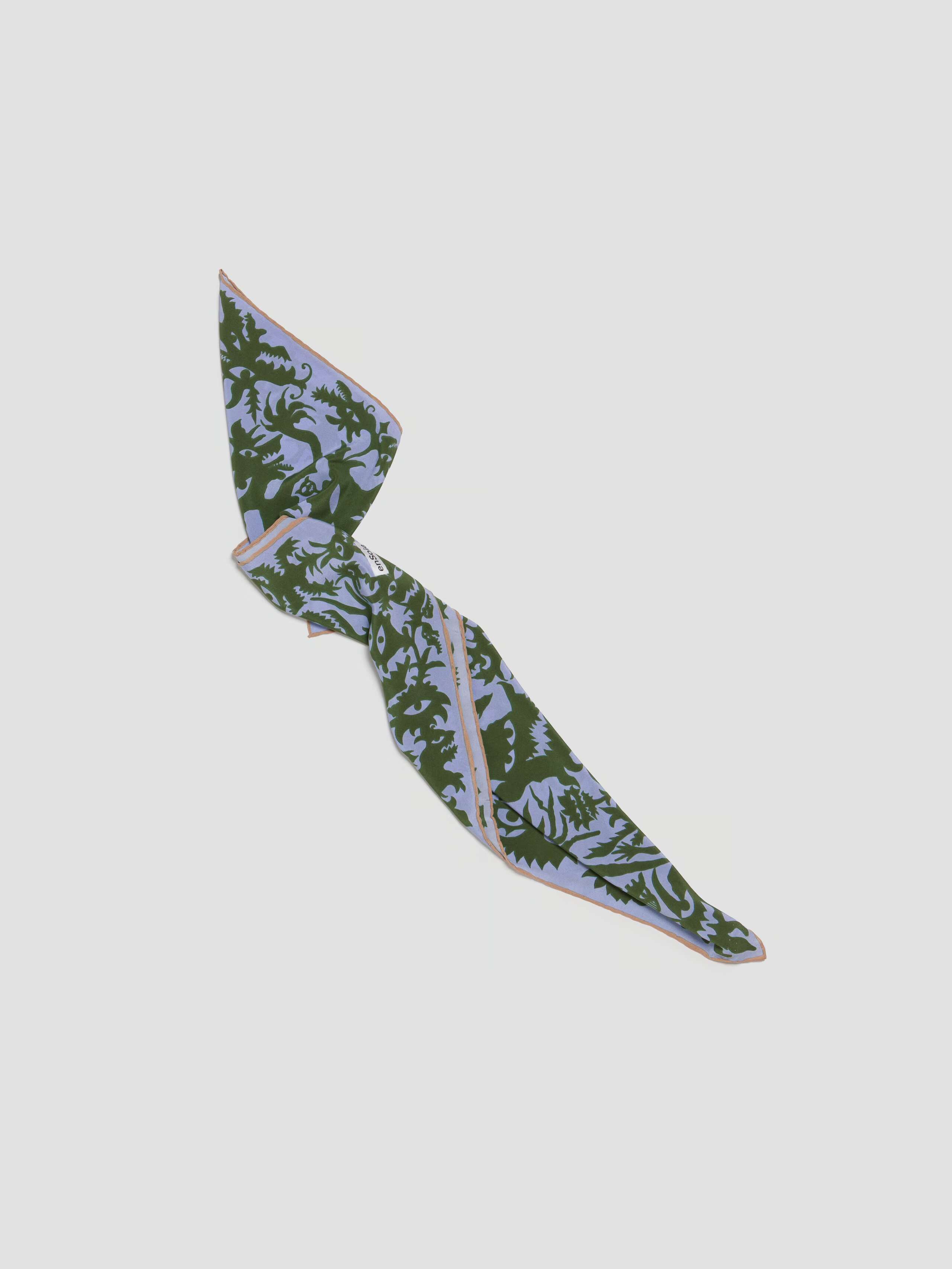 Product Shot of folded up Crepe de Chine Monster Foulard Blue Green 