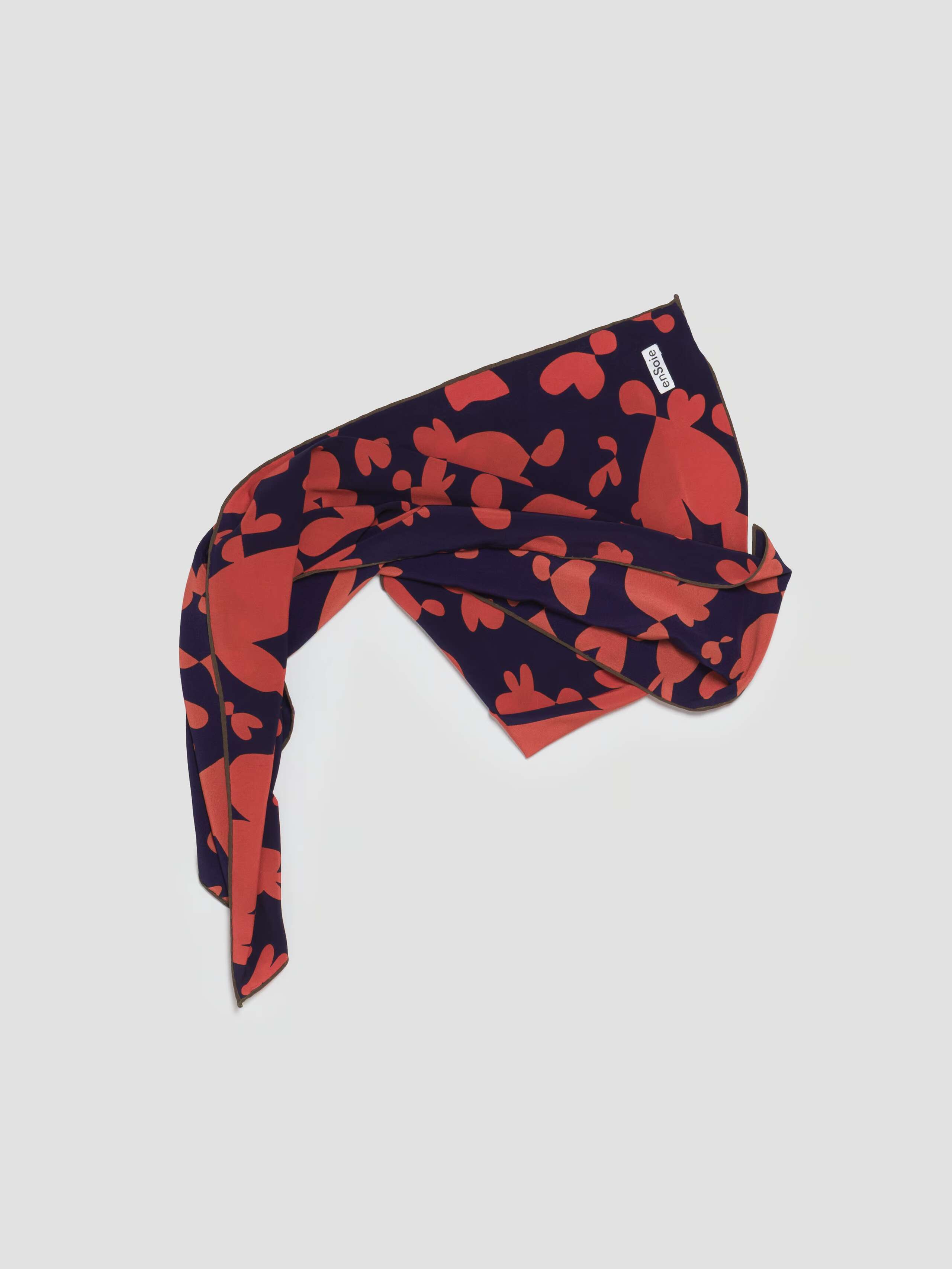 Product Shot of Inspired Hearts Crepe de Chine Foulard in navy red scrunched up 