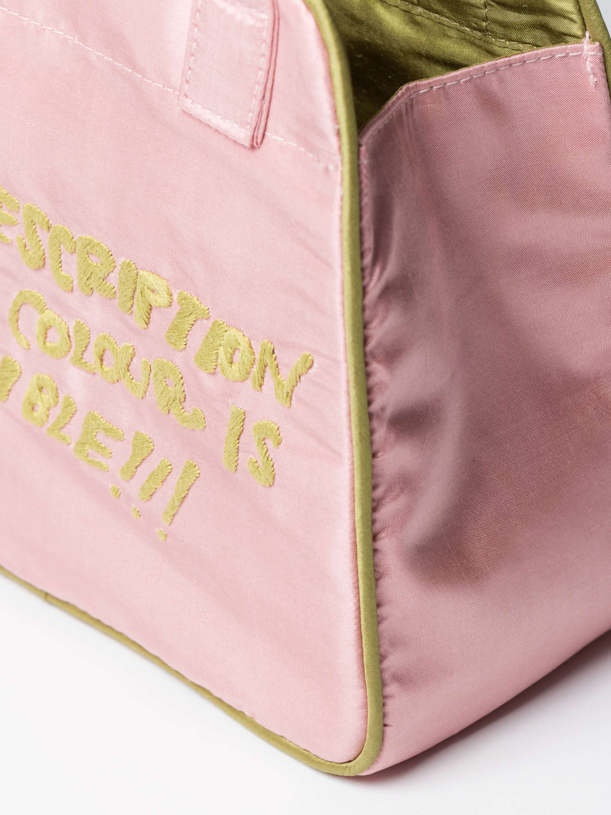 Detail Shot of Daisy Proverb Doupion Bag Description of a Color embroidery in Fleur Rose