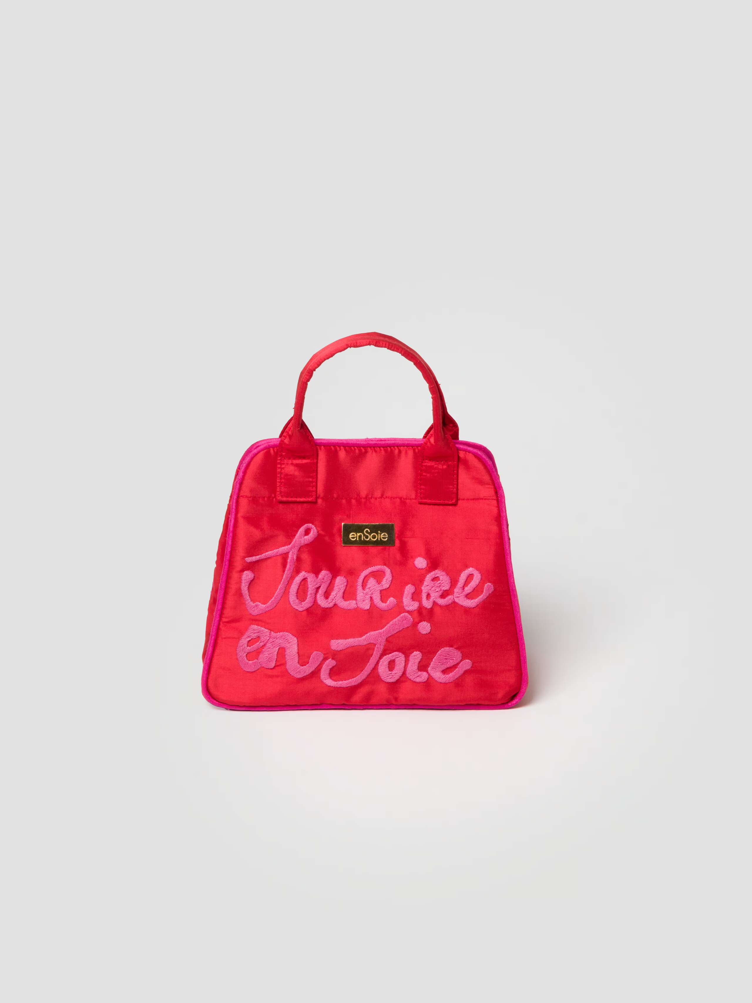 Front Product Shot of Daisy Proverb Bag Sourire en Soie embroidery side in Warmest Red 