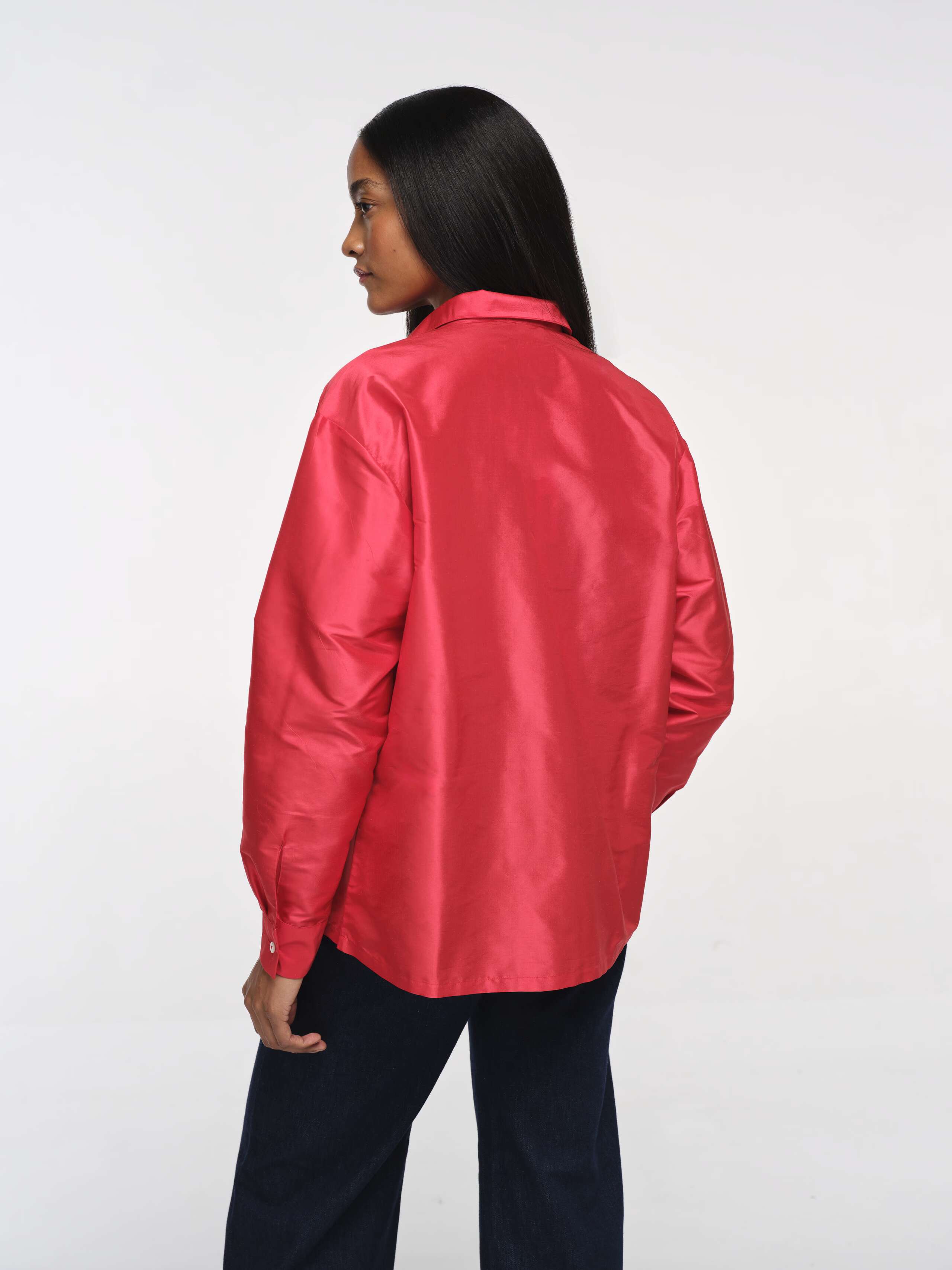 Closeup Back Shot of Model Wearing Warm Red Doupion Francesca Blouse