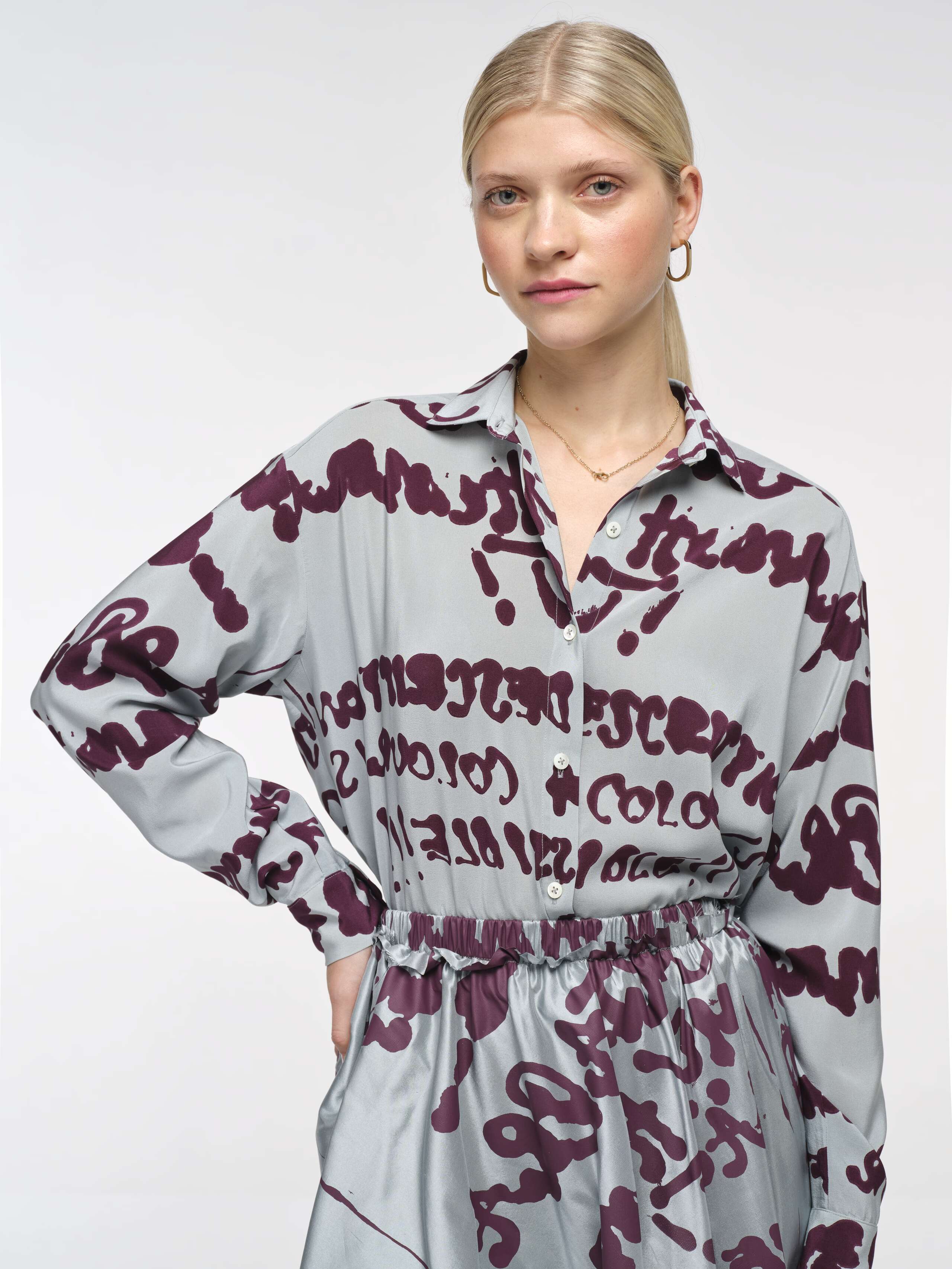 Closeup Front Shot of Model wearing Francesca Proverb Blouse in Dream Blue 