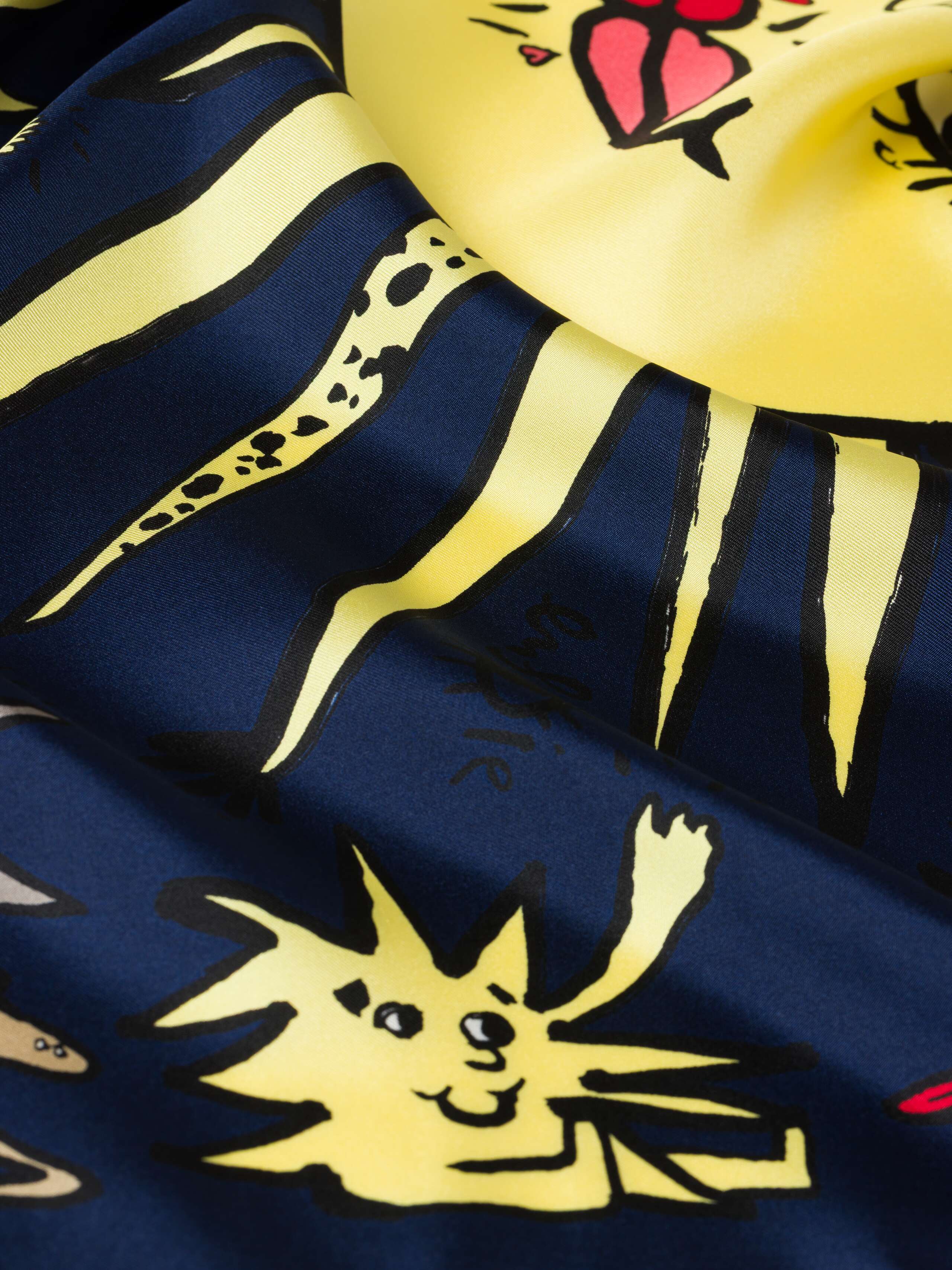 product detail shot of navy ojo de agua silk foulard