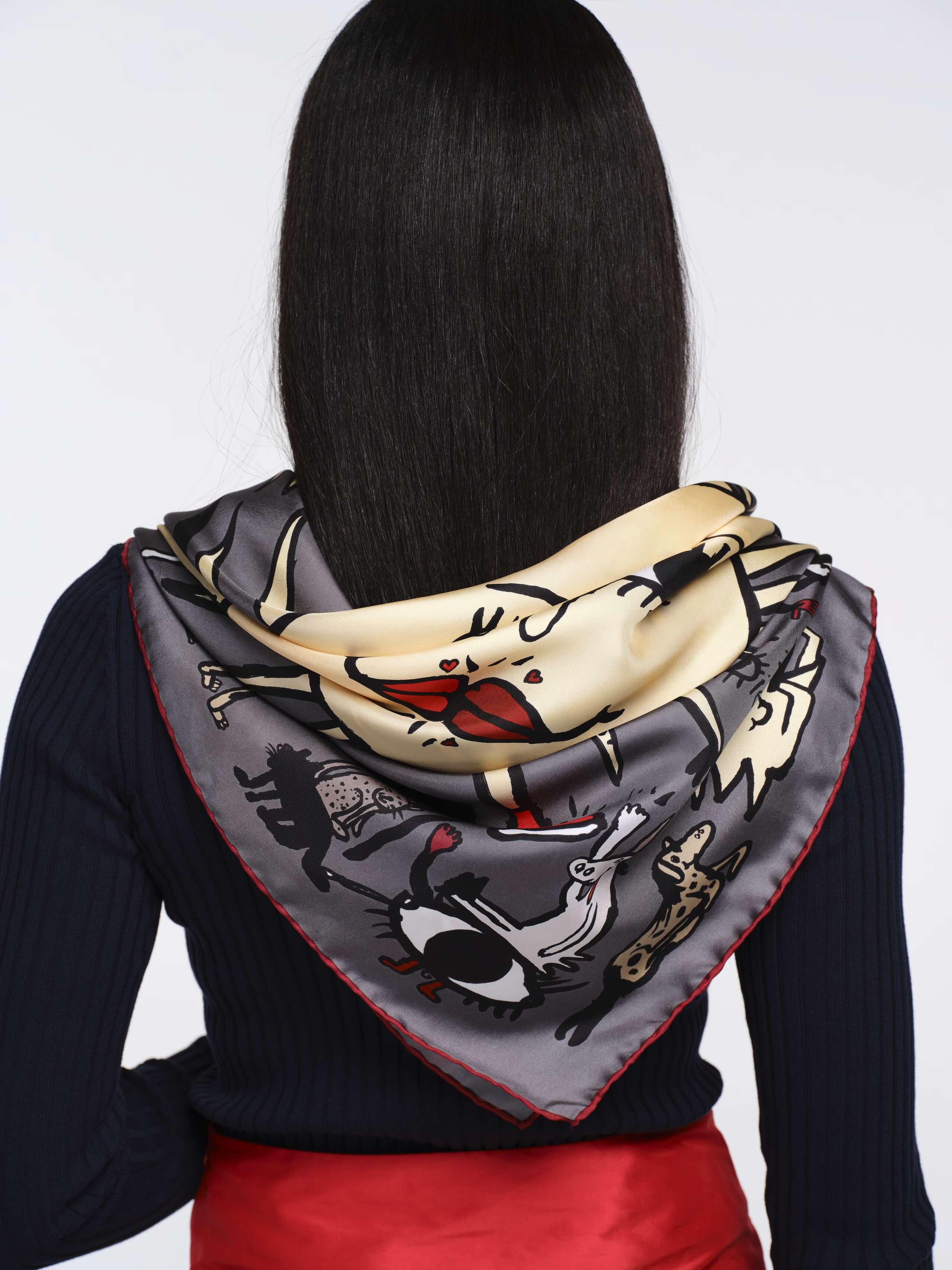 Back Closeup shot of Model Wearing grey Ojo de Agua silk foulard 