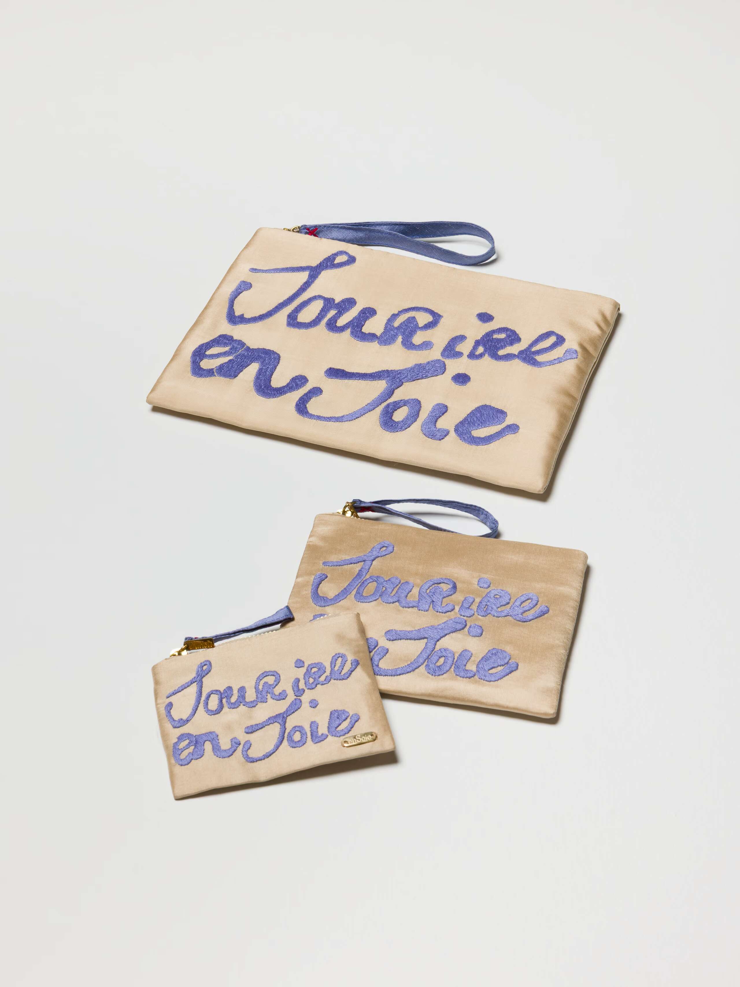 Product Shot of all 3 Proverb Clutches in Gold Beige 