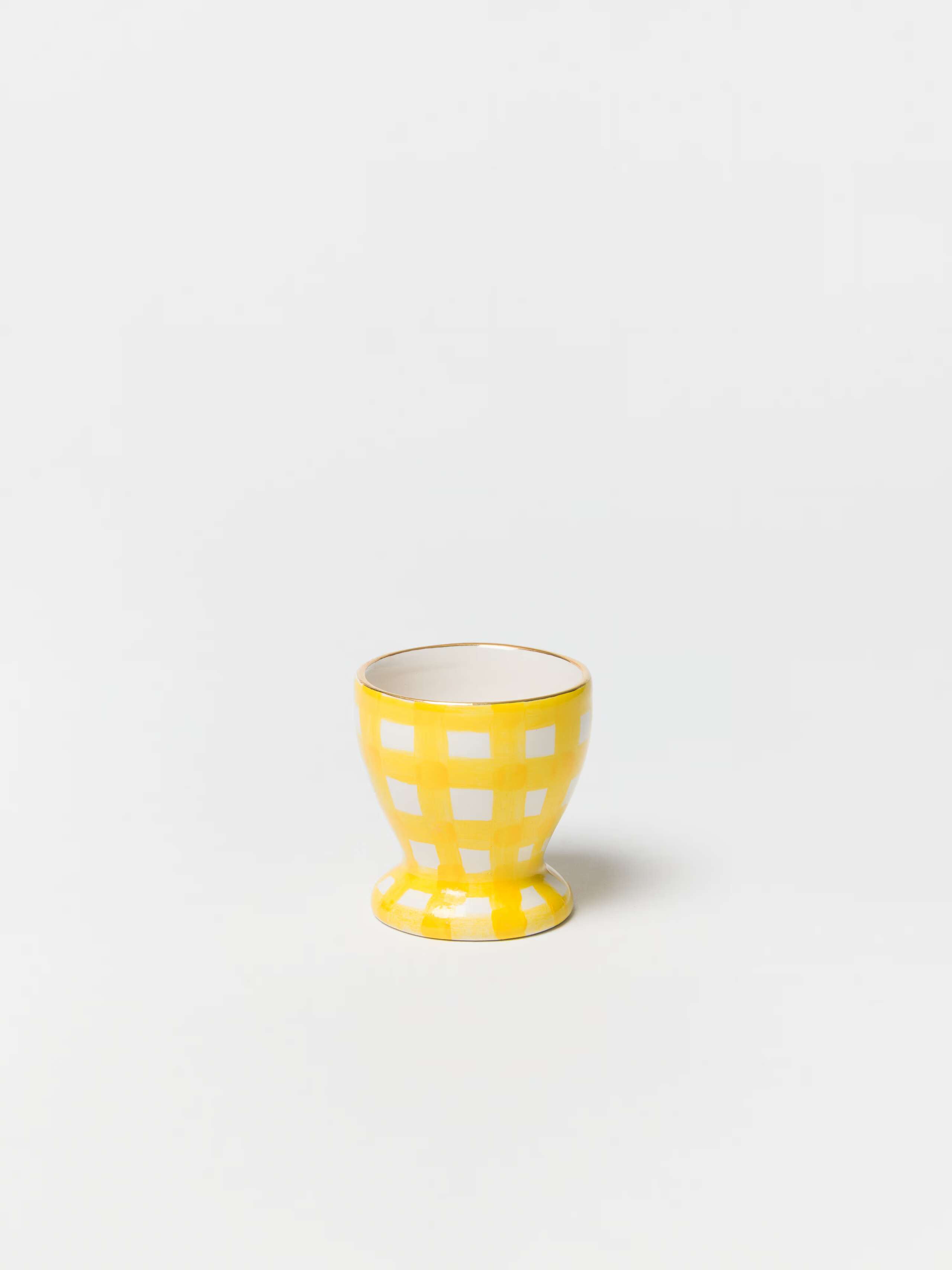 product shot of greta egg cup in sunny yellow