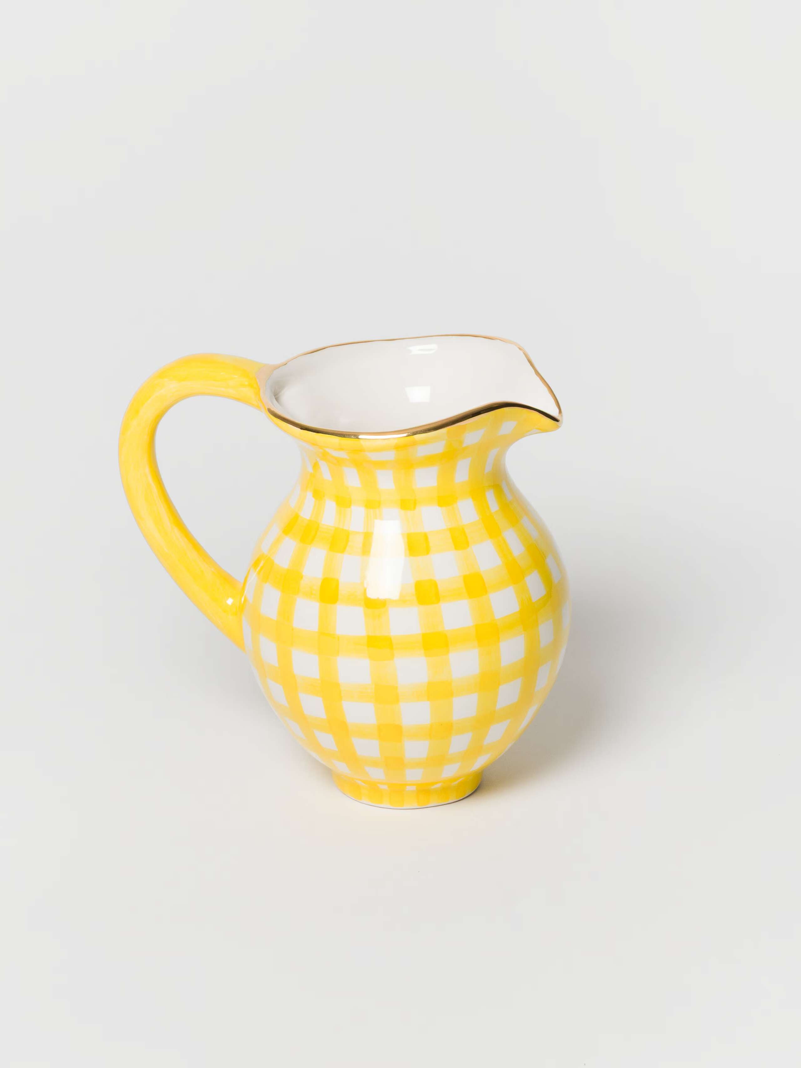front product shot of milk jug in sunny yellow