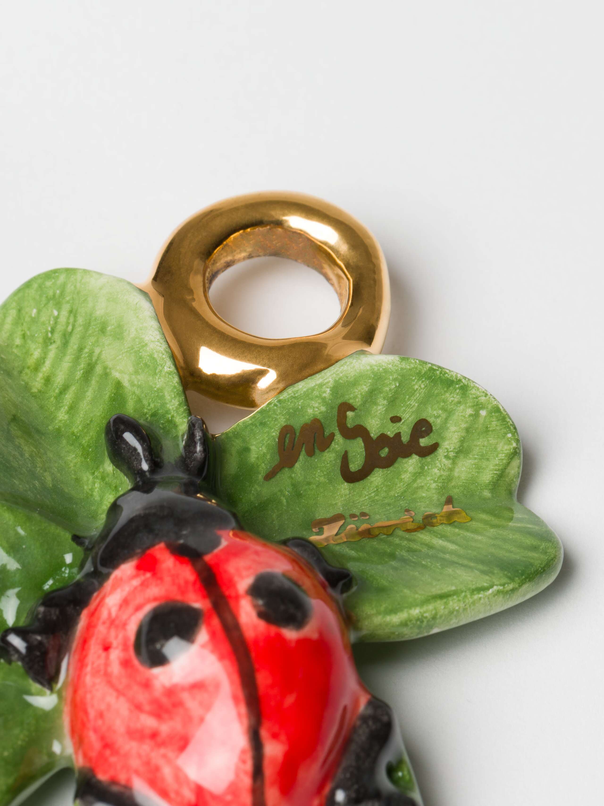 Detail shot of Ladybug with Clover Ornament