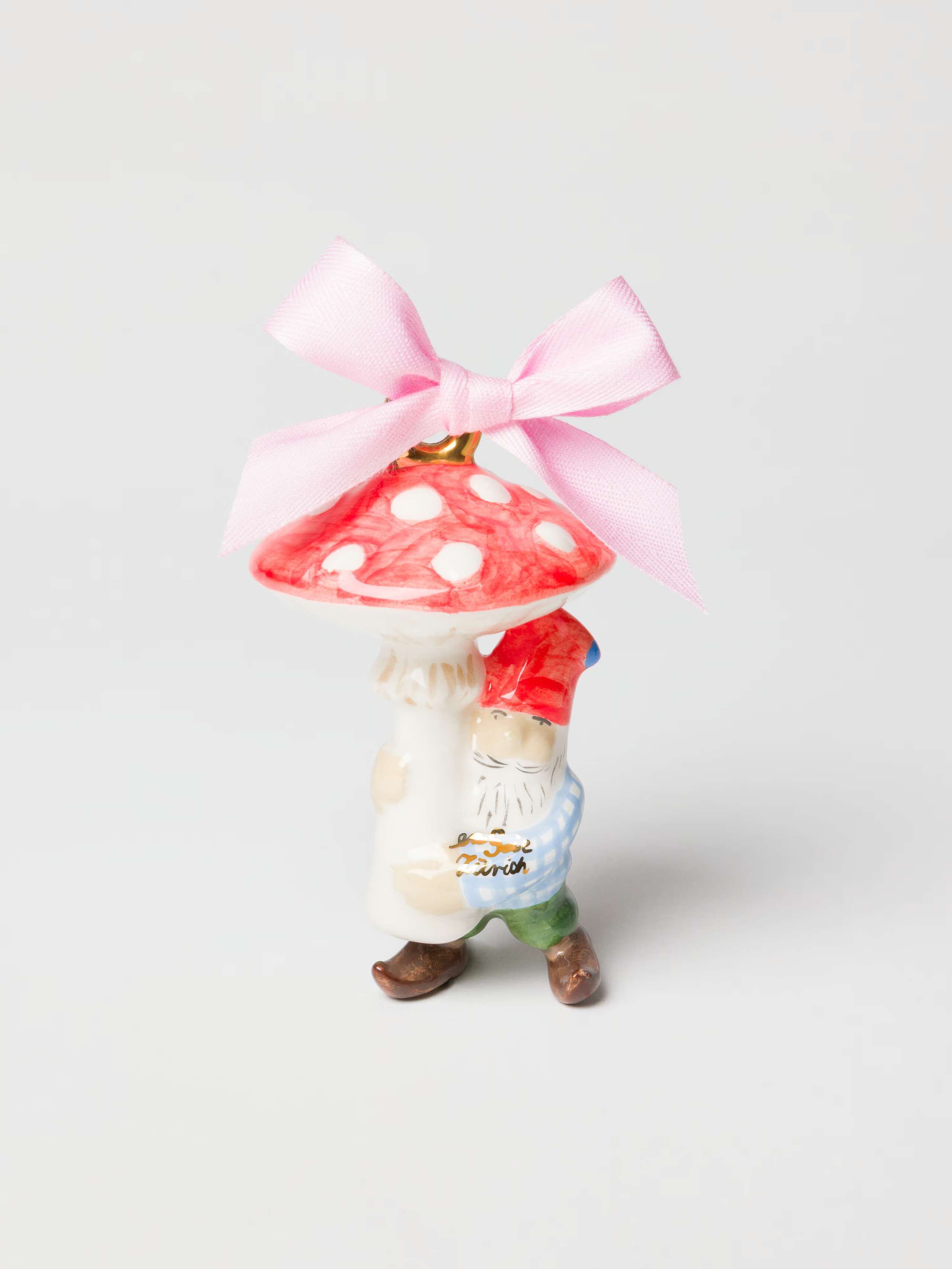 Product shot of Gnome Hugging Mushroom Ornament with Pink Cotton Bow