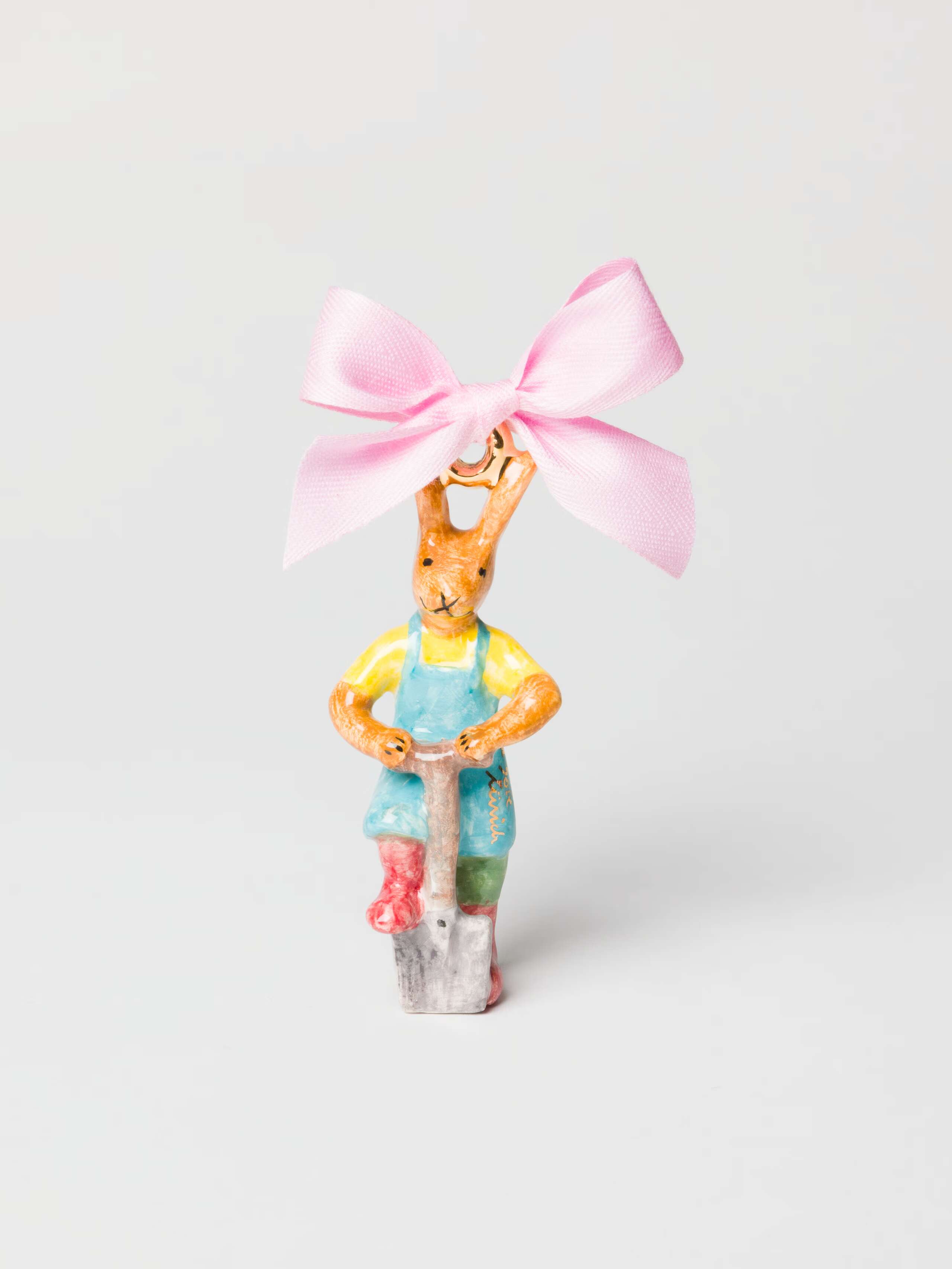 Product shot of Rabbit with Rake Ornament with Pink Cotton Bow