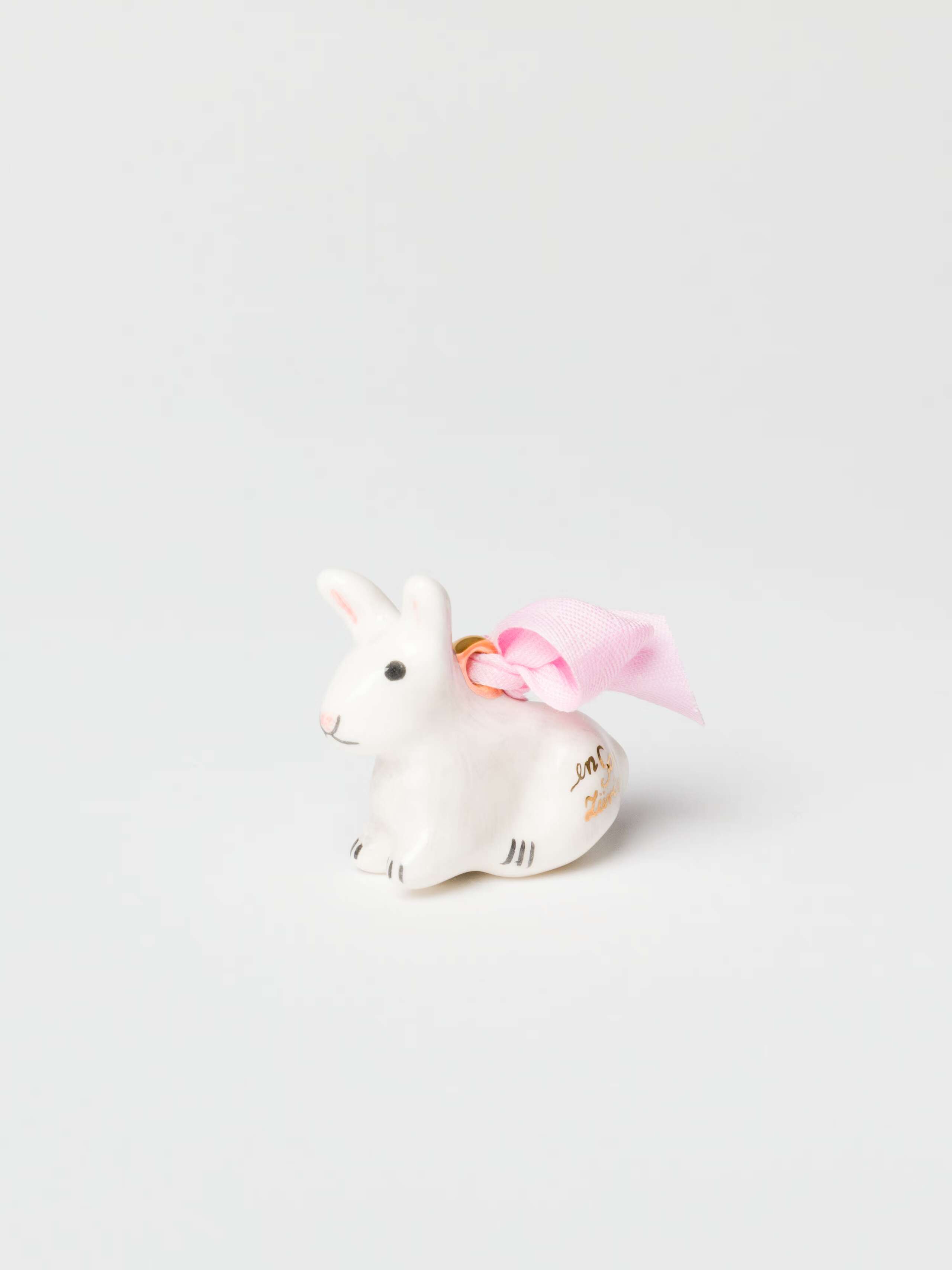 Product Shot of Small Sitting Rabbit Ornament with Pink Cotton Bow