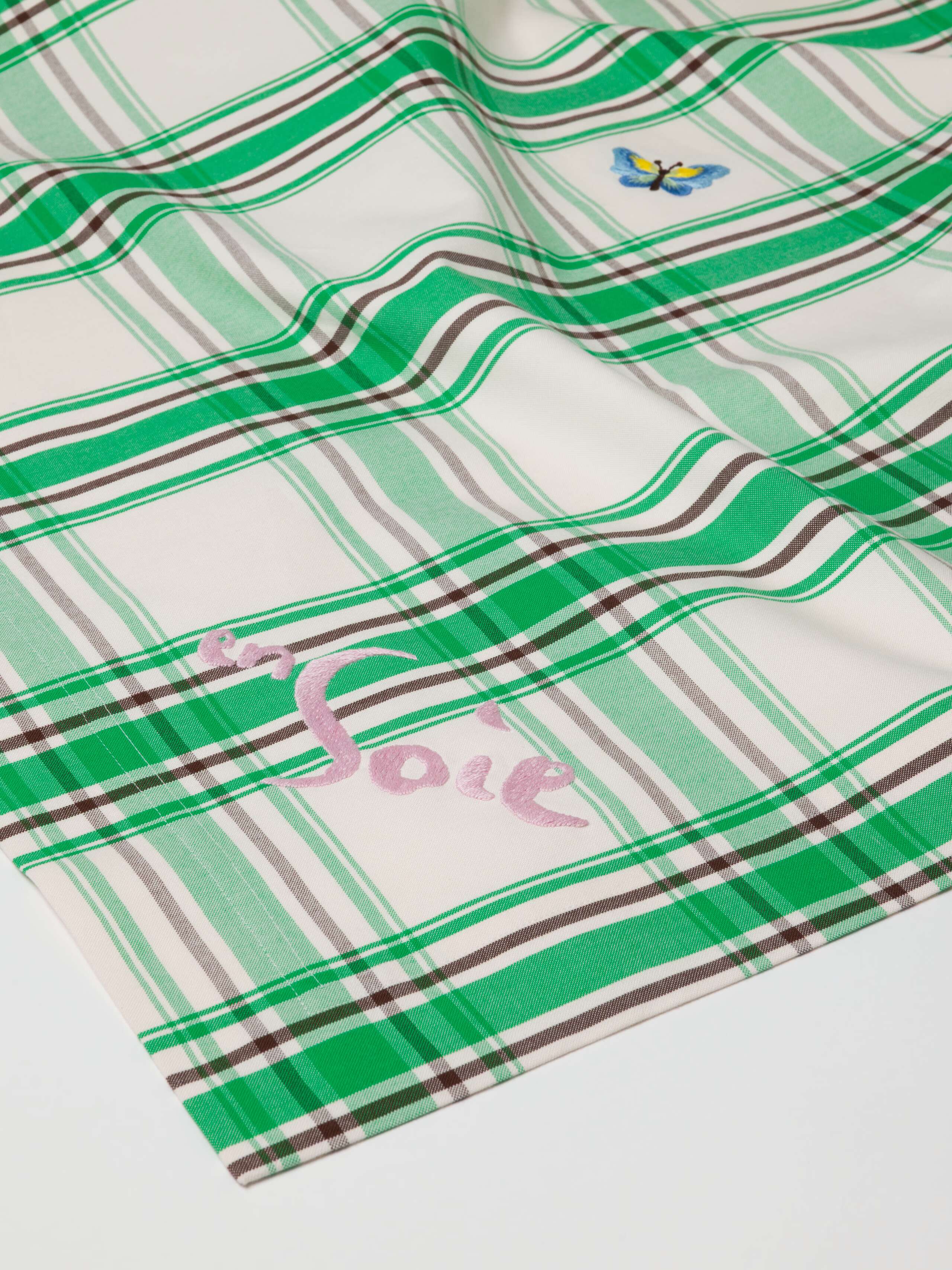 Charlotte Table cloth in bright meadow check, embroidered with small butterflies and with candy pink enSoie signature embroidery