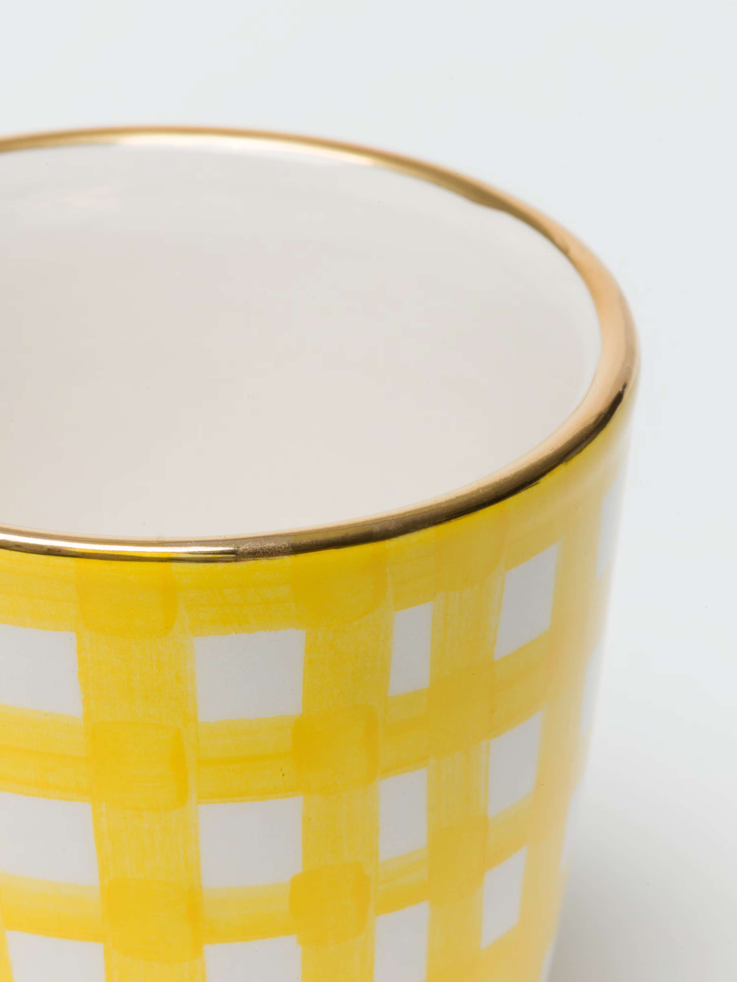 closeup detail shot of gold rim on the XS vase in sunny yellow 