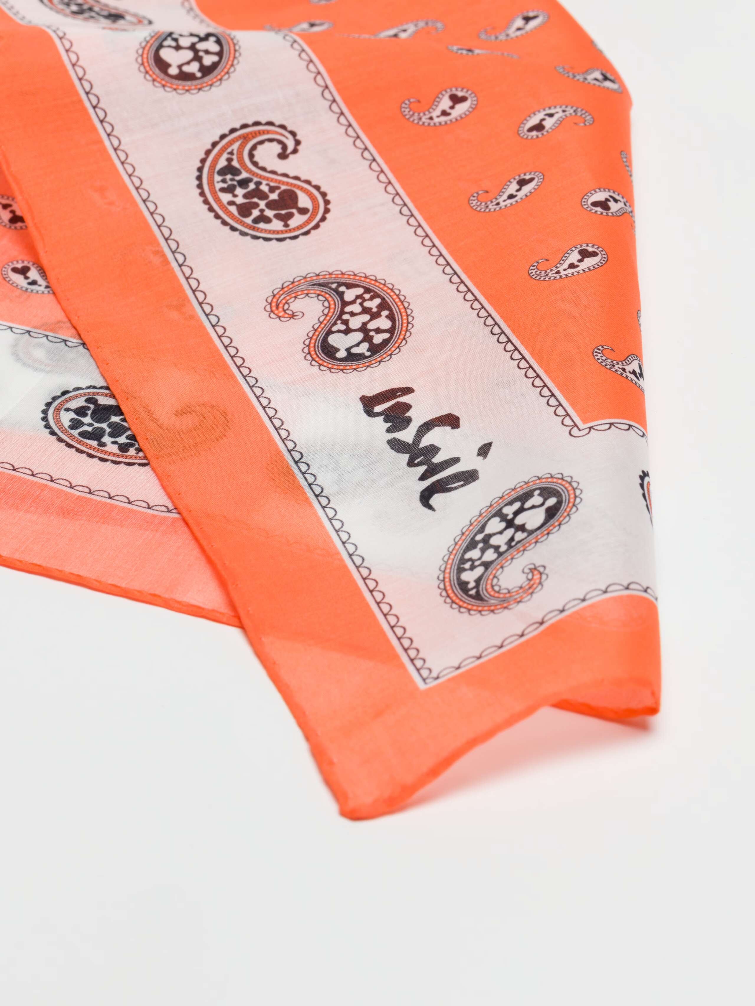 Detail Shot of Carre Foulard Paisley Print in Sunburst Orange 