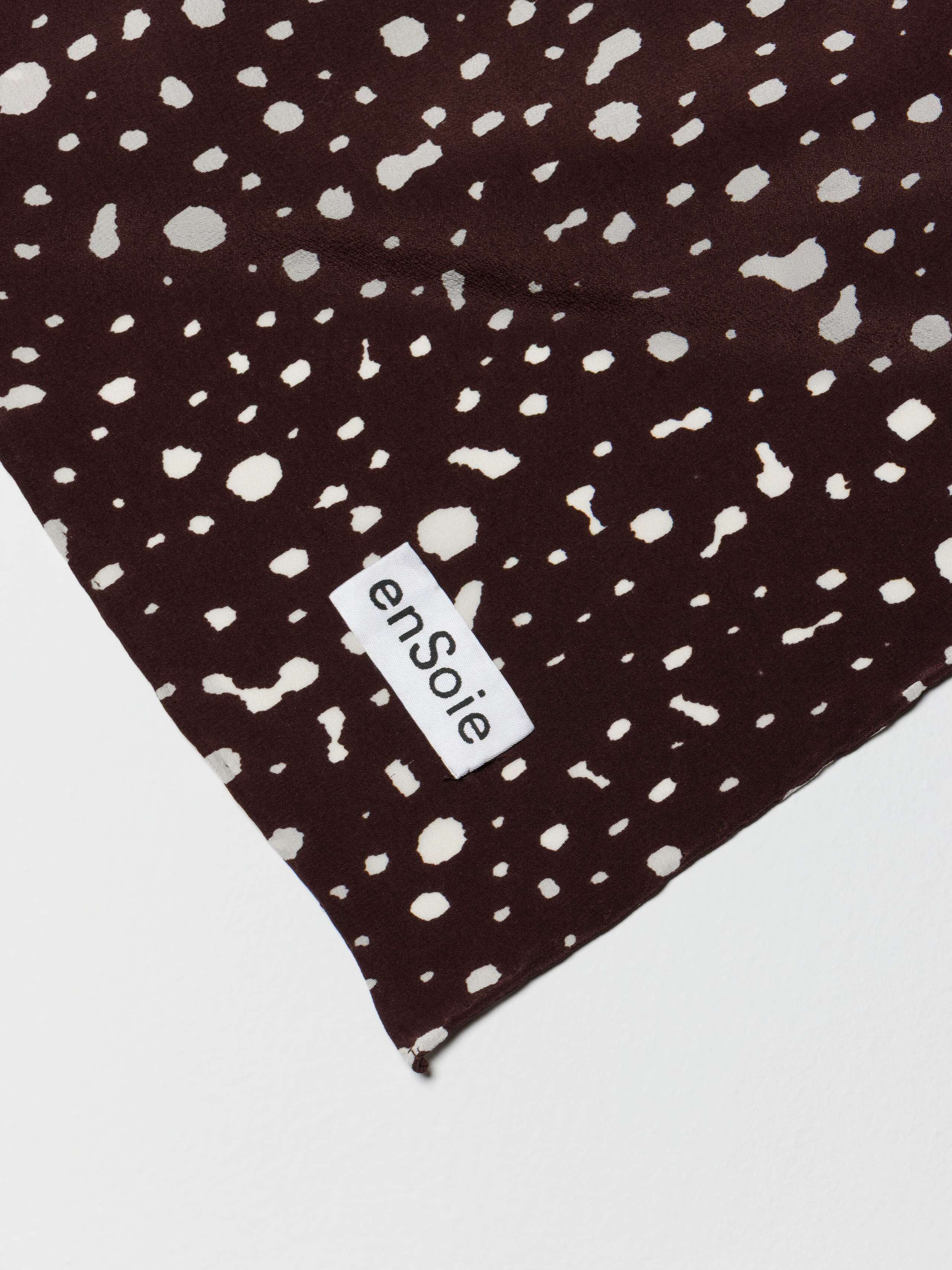 Detail shot of enSoie label on Carre Foulard in Bambi Print
