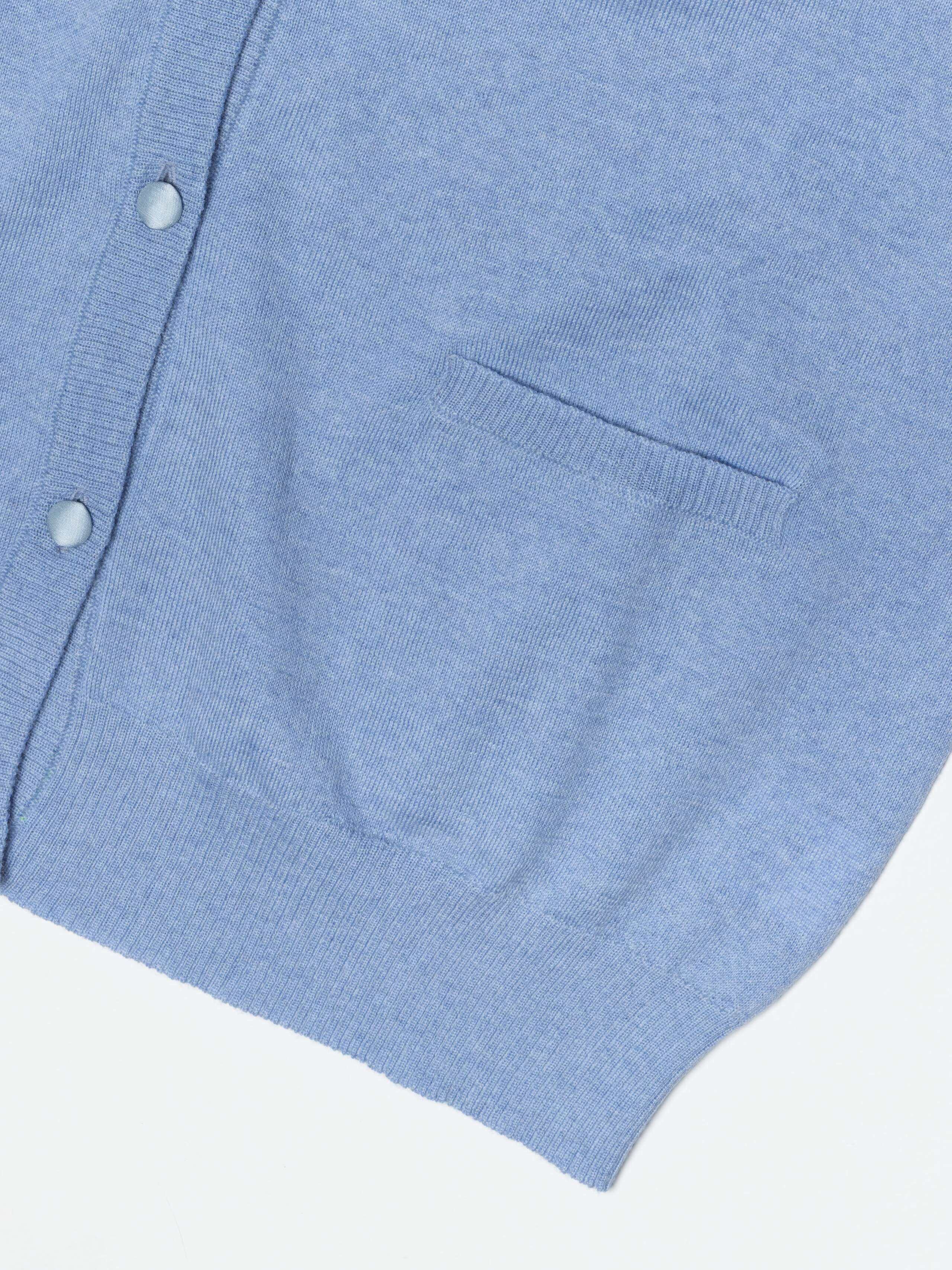 Detail Shot of Bea cardigan pocket in Dream Blue