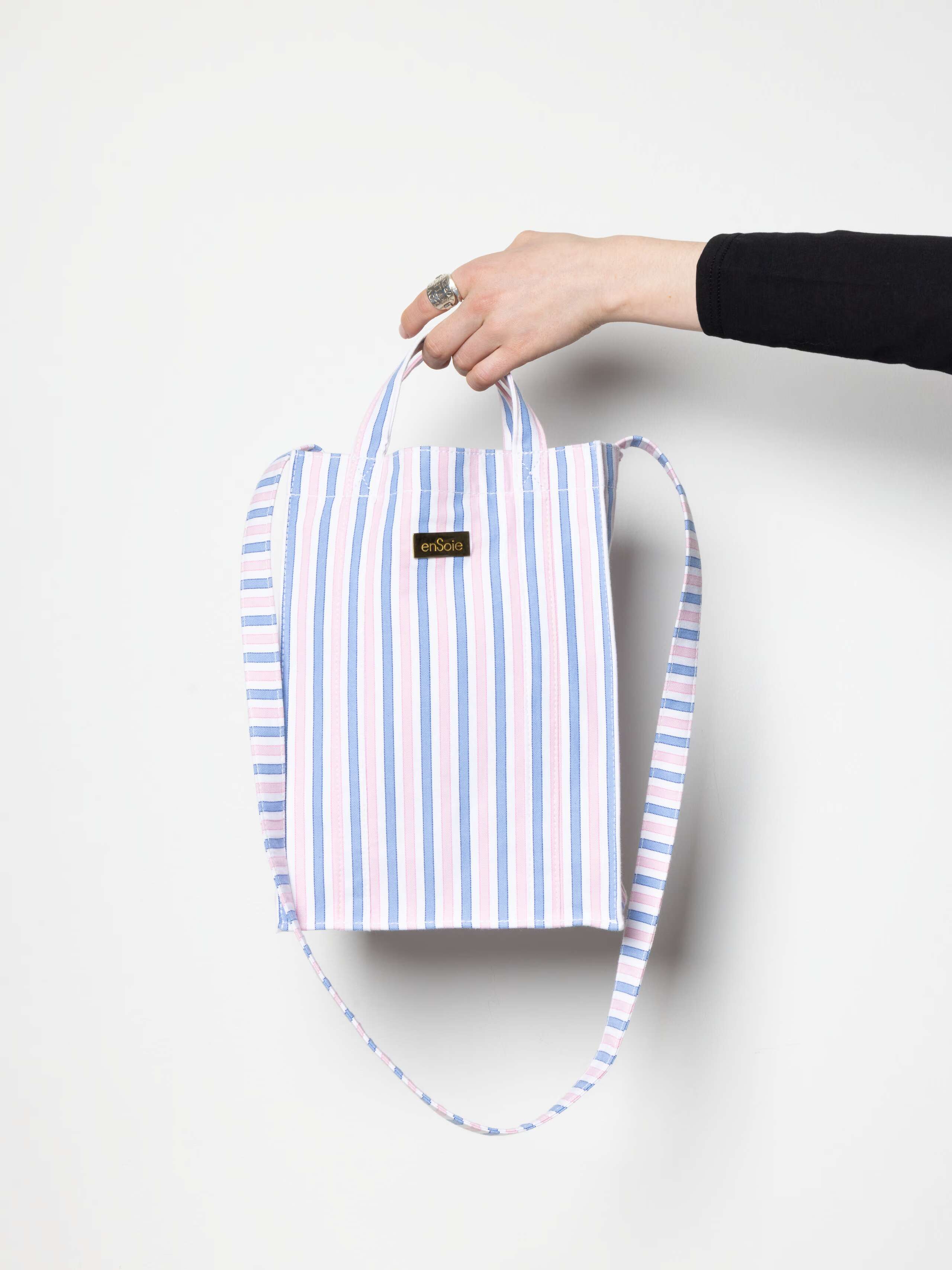 Product Shot of S Cabas Oxford Stripes Pink in hand 