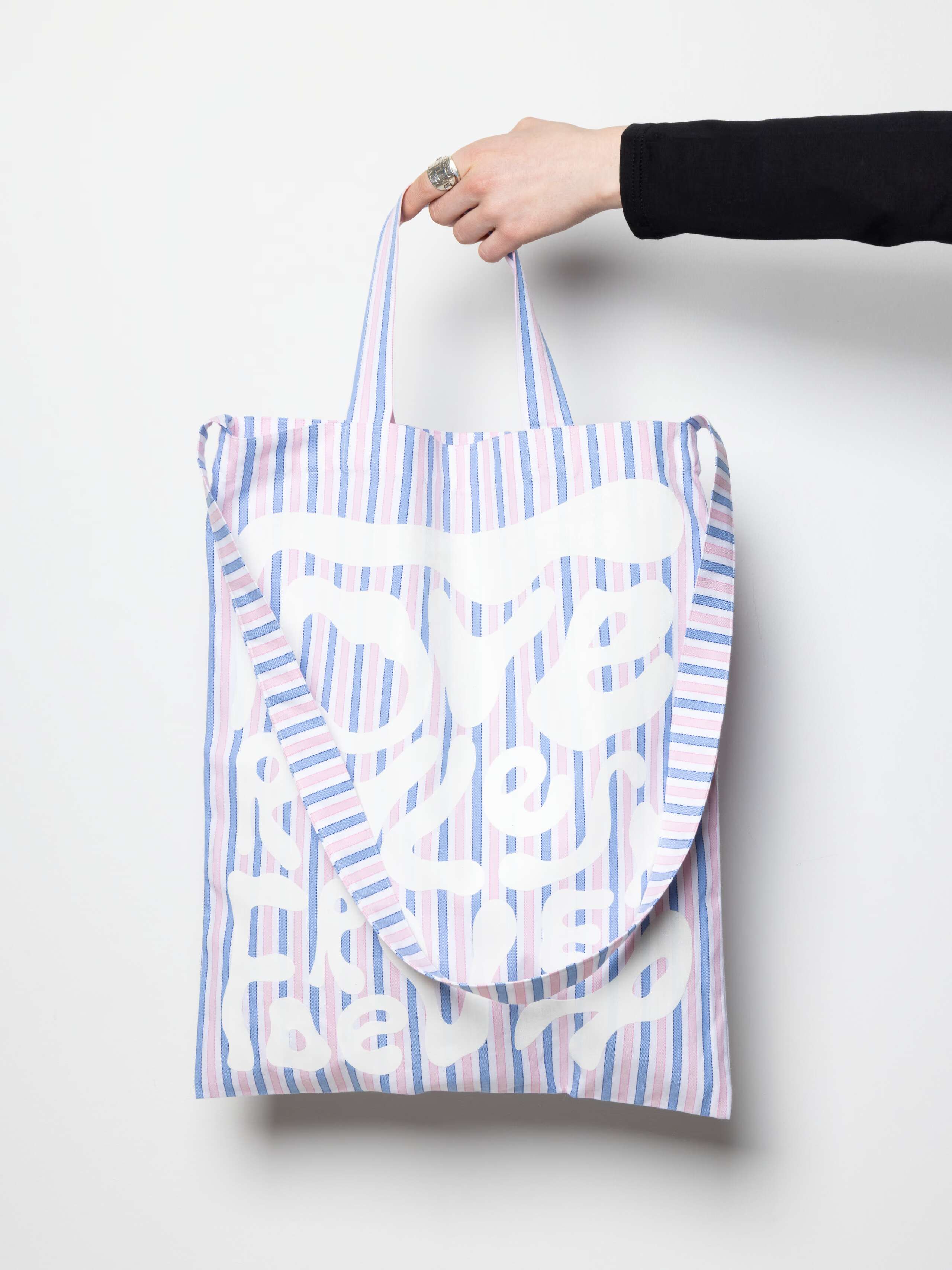 Product Shot of Carry All in Oxford Stripes Pink in hand 