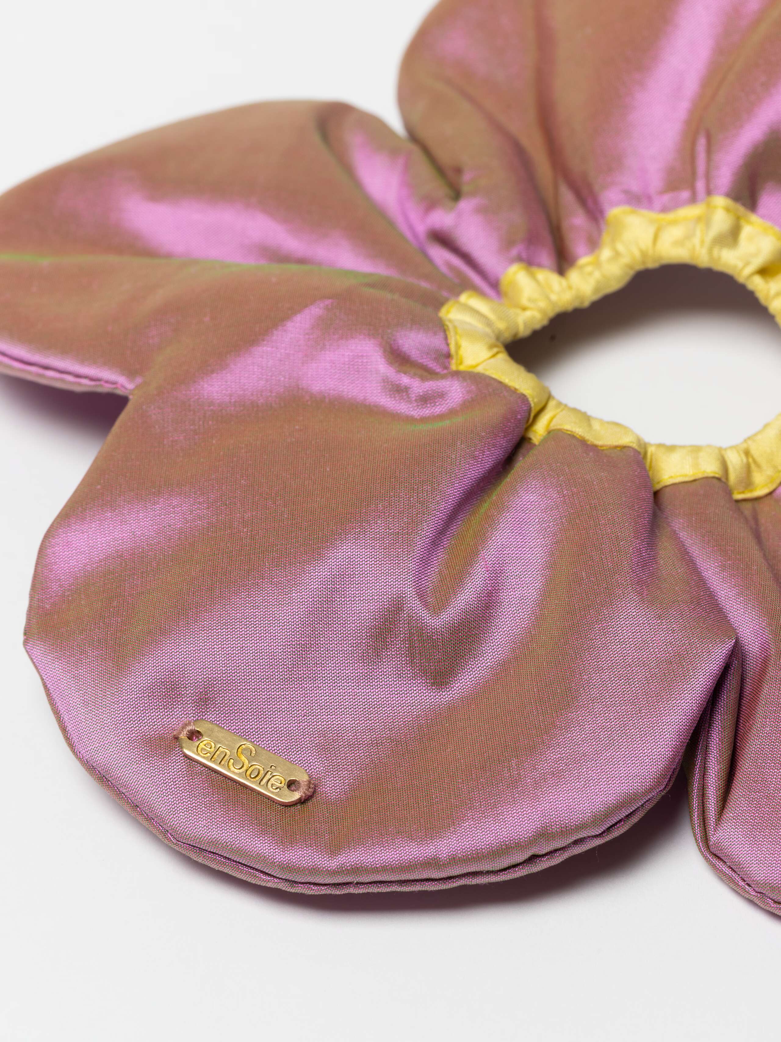 Detail Shot of messing label on pink flower scrunchie