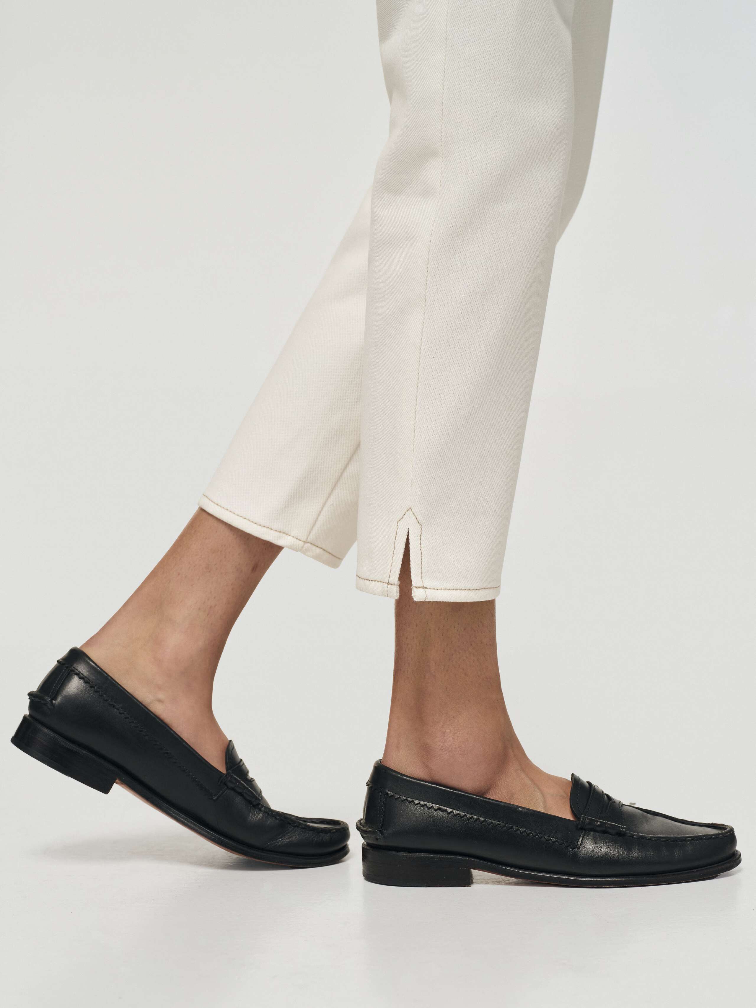 Detail Shot of Hem for Poppy Jeans in Ecru