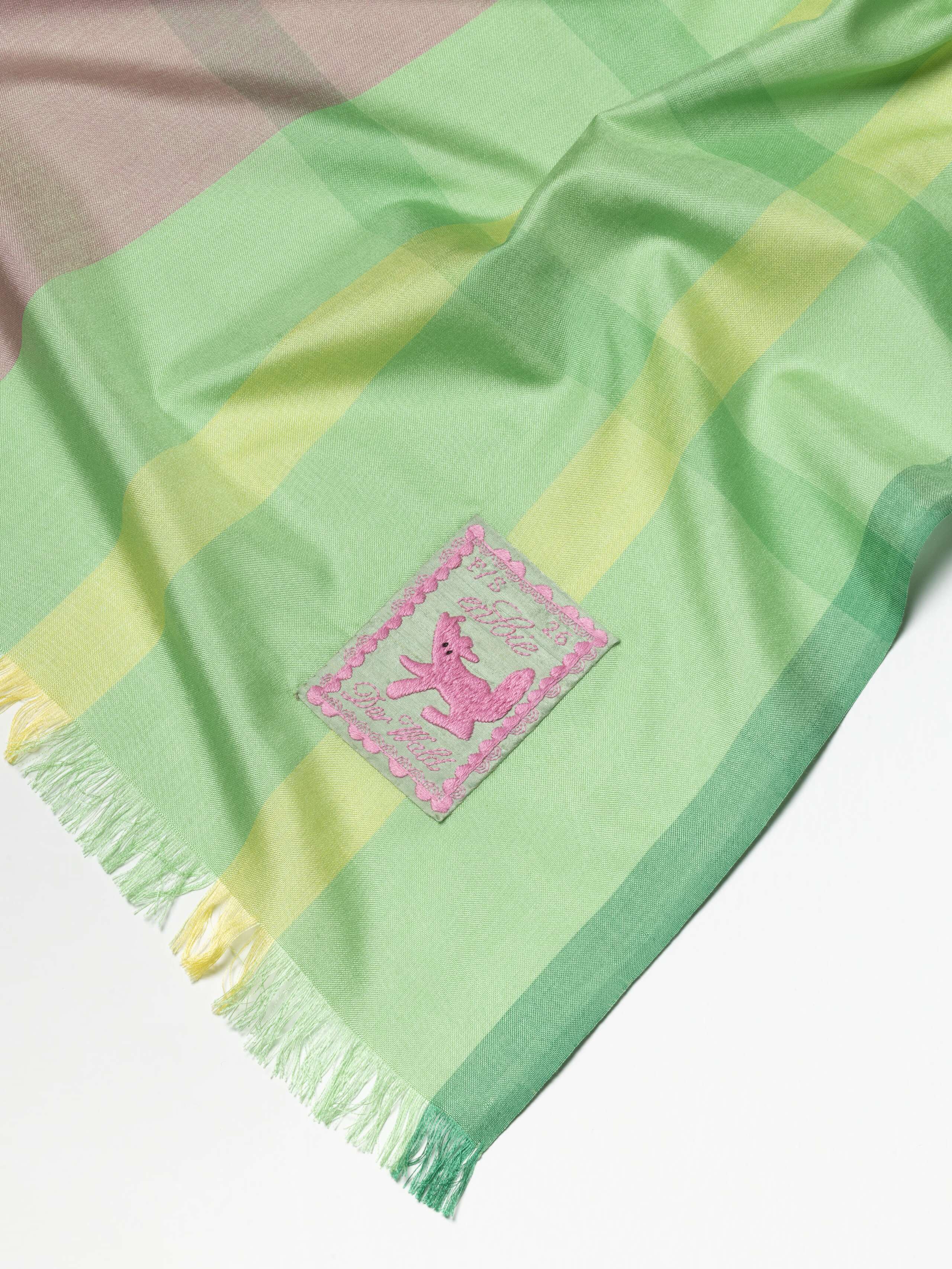 detail shot of label for Satu Scarf 160 in Tulips 
