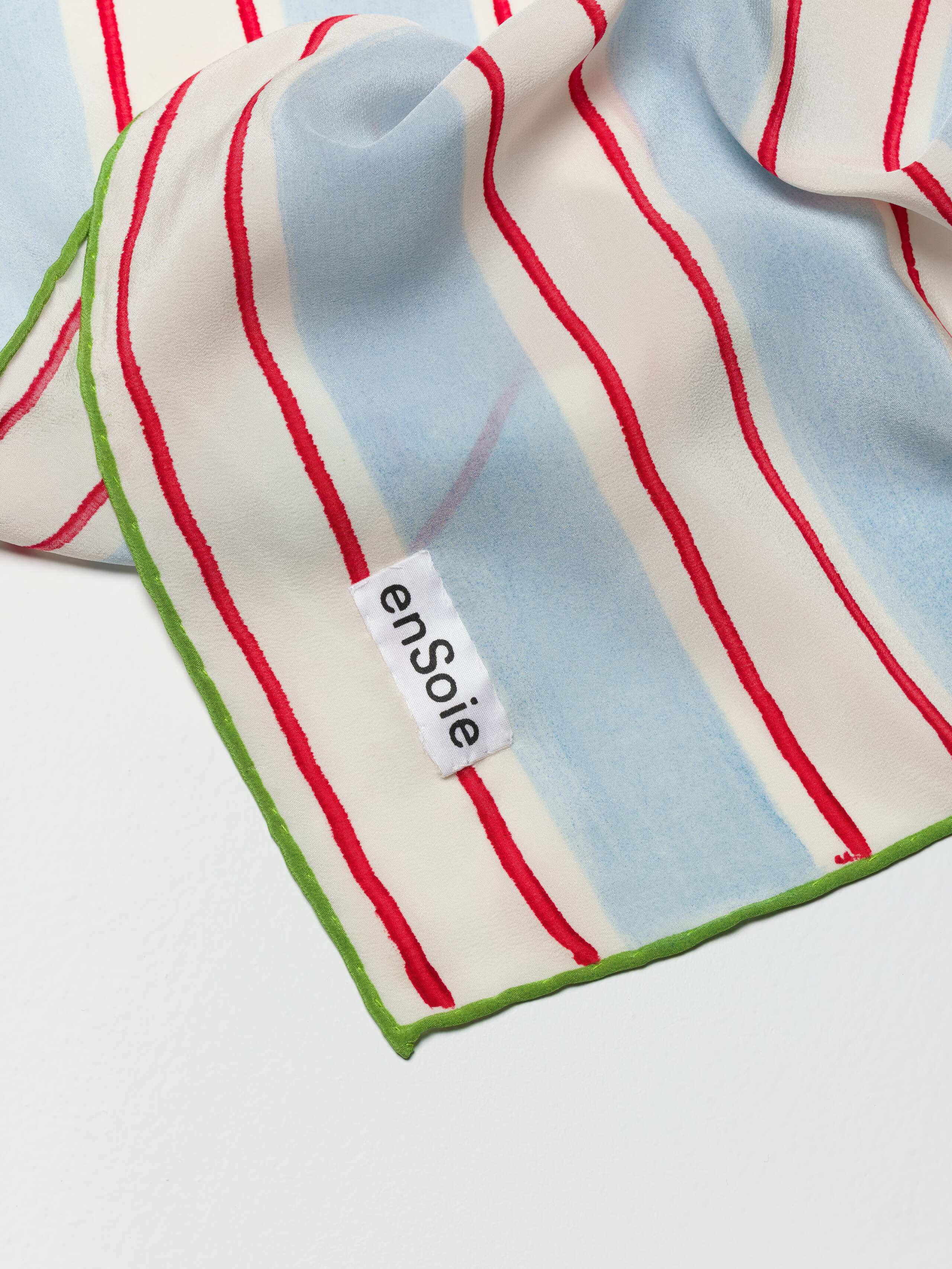 detail Shot of label for Handpainted Stripes Foulard in light blue