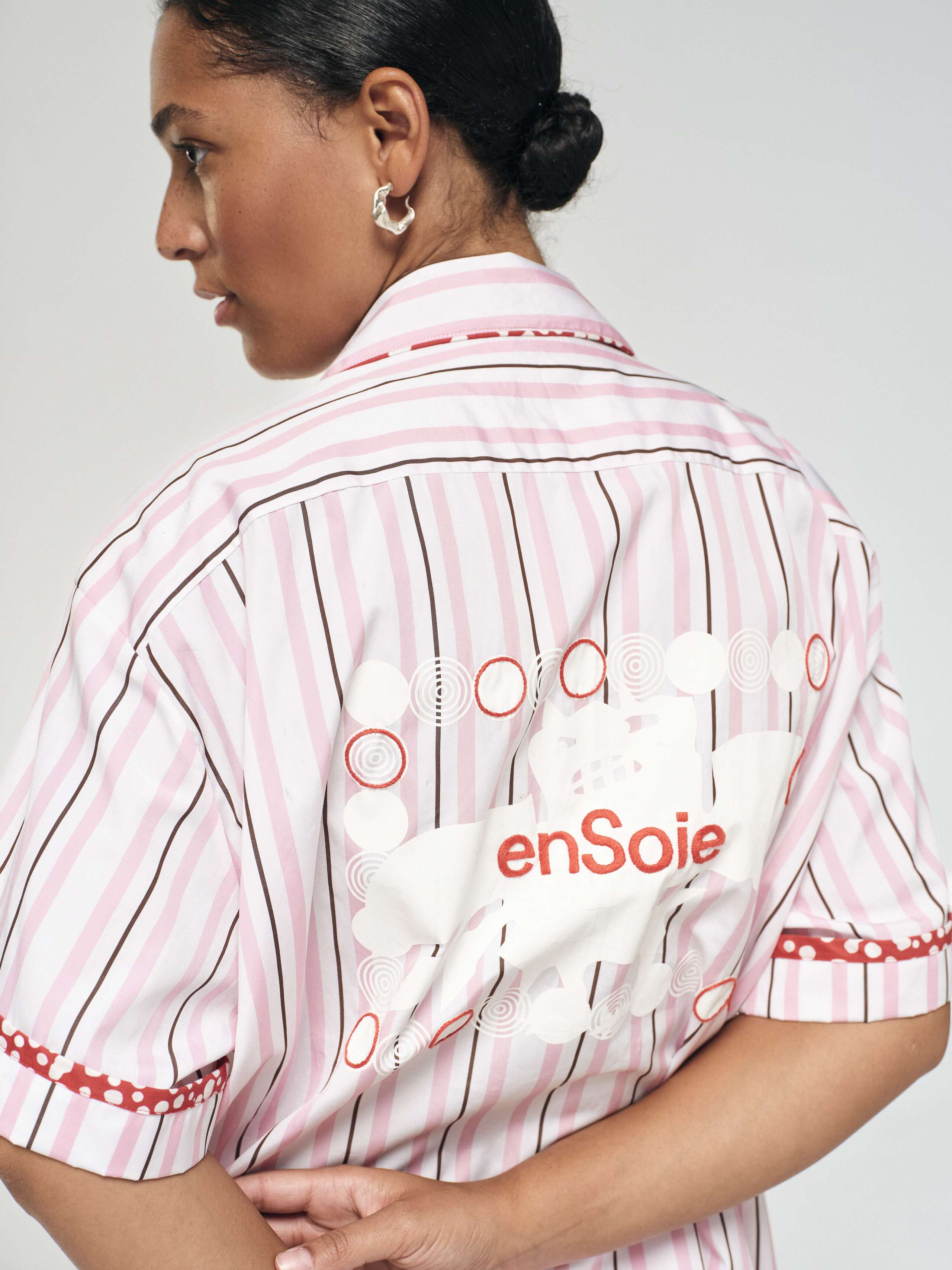 tanner shirt in rose stripes with hand printed detail on back