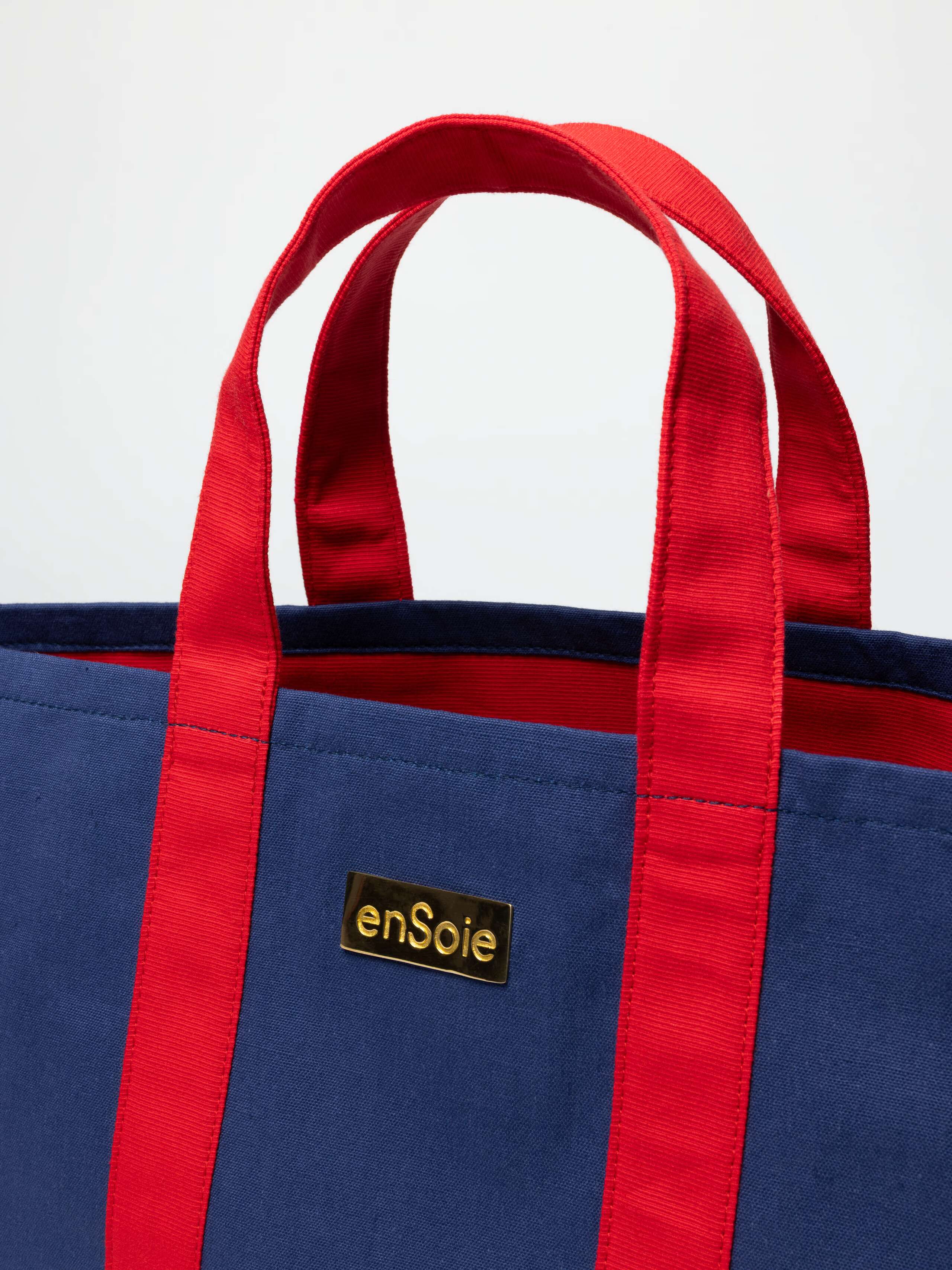 Upstate bag in indigo blue, red handles