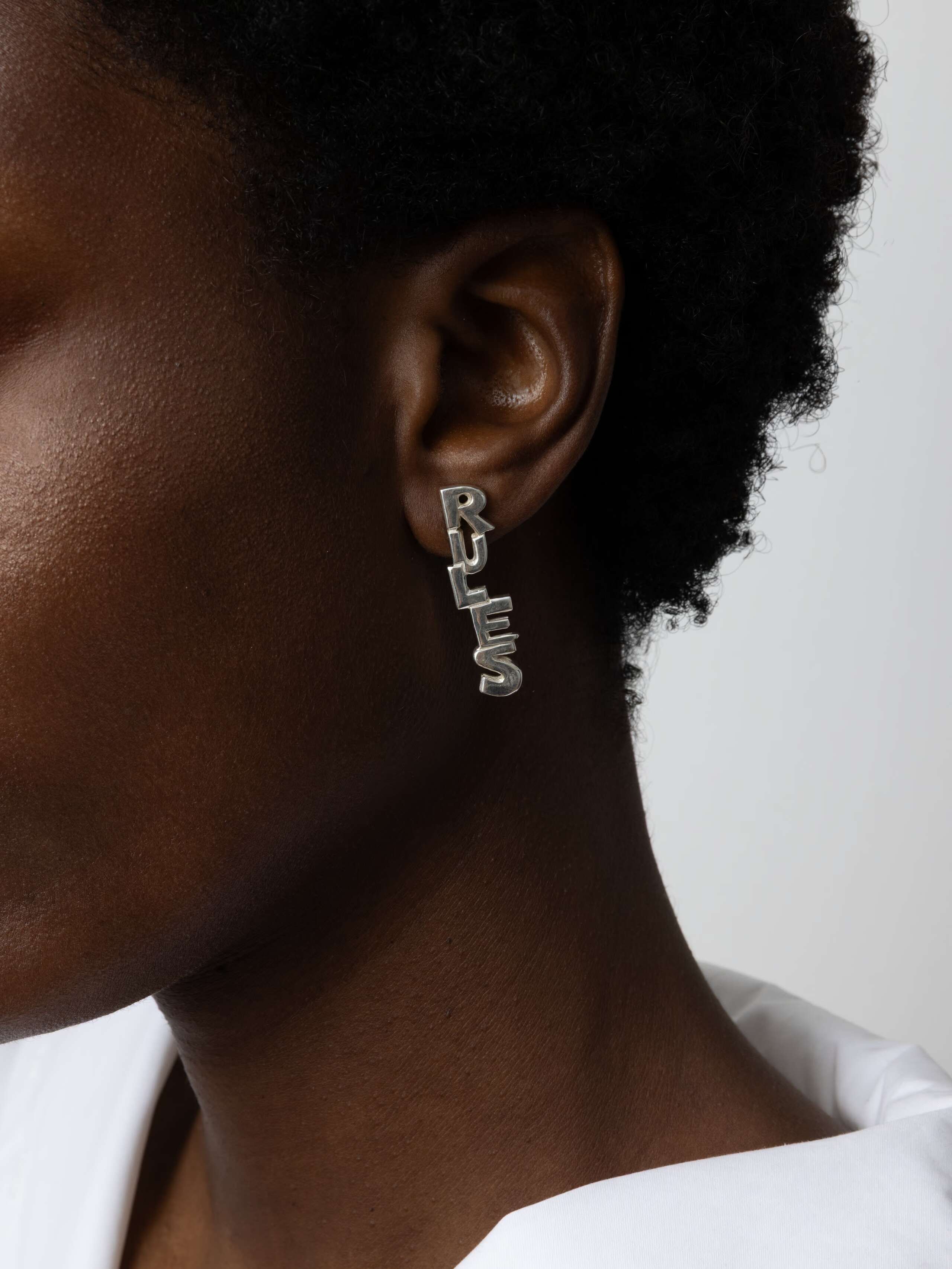 Product Shot of LRF Earrings Silver on Model