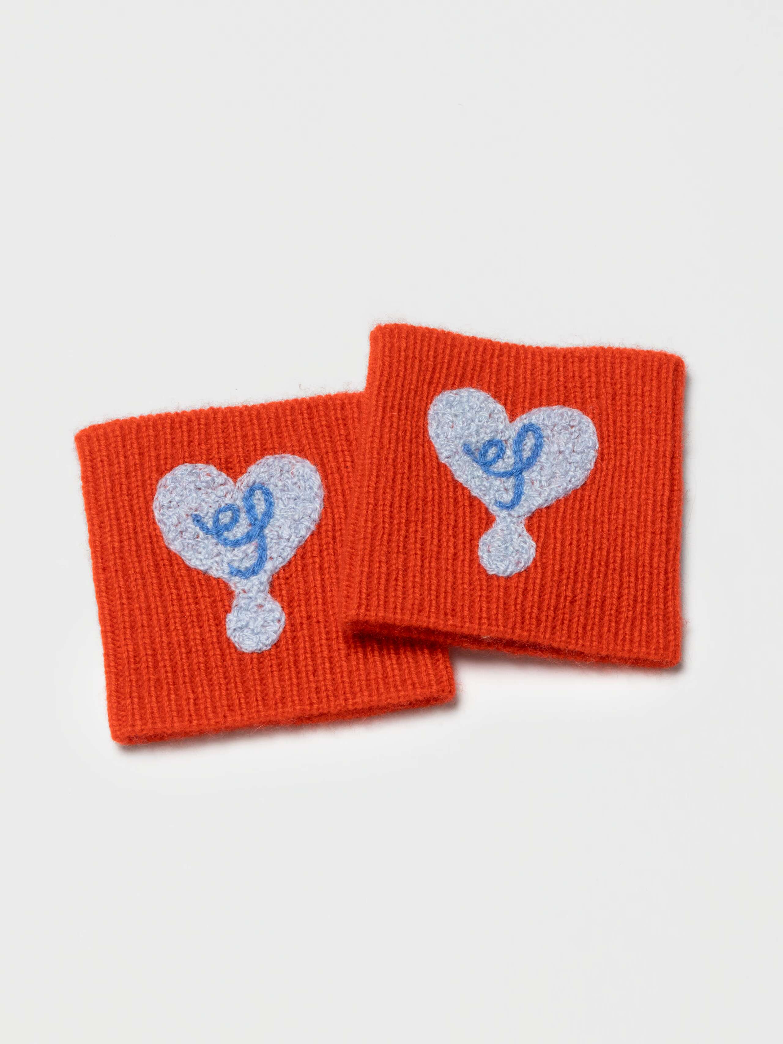 Product Shot of Coco Wrist Warmers in Red