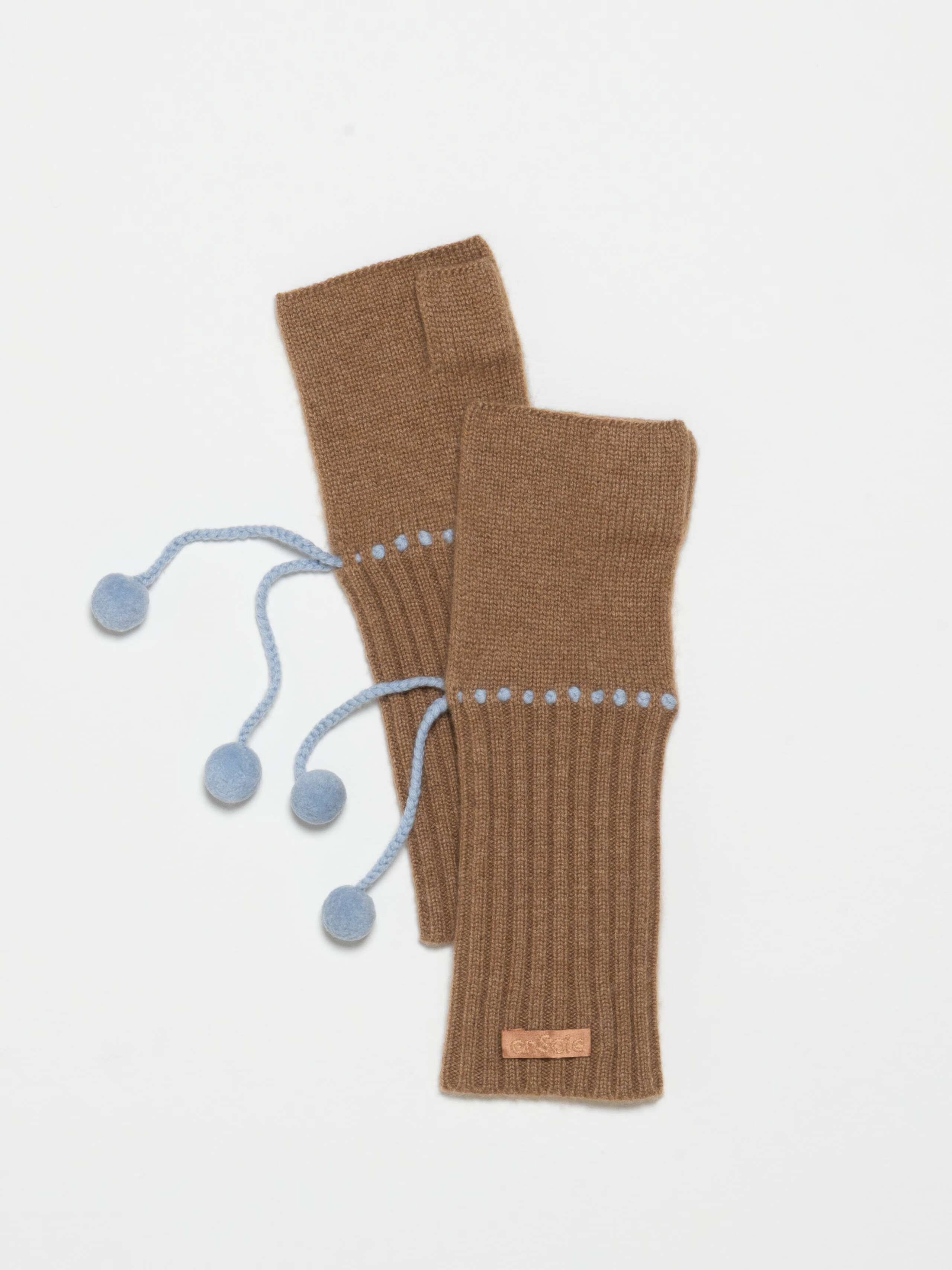 Product Shot of Frida Mittens Pompons in Caramel